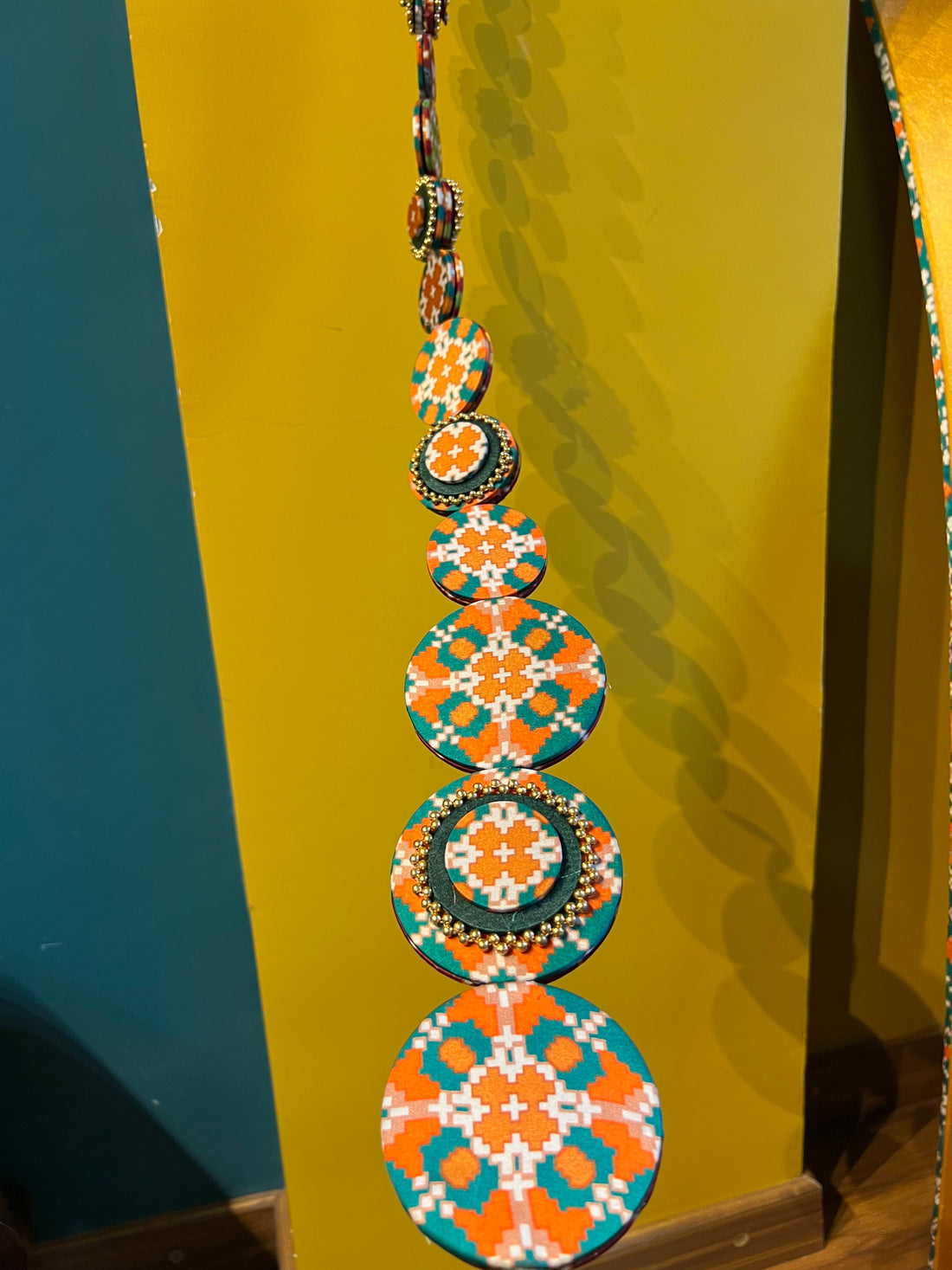 Dangler Ganesh Hanging: Bottle Green & Maroon Navratna Patola