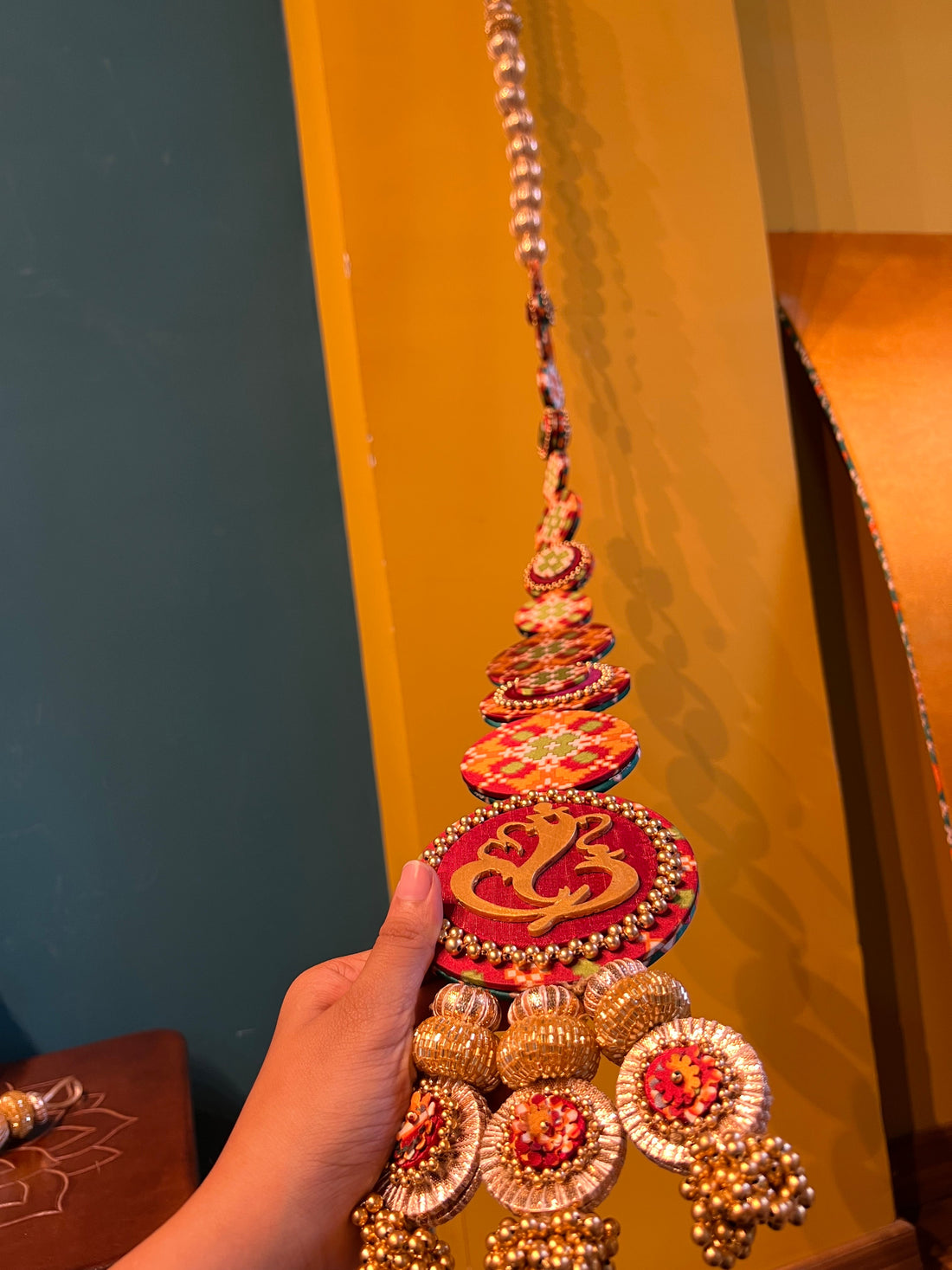 Dangler Ganesh Hanging: Bottle Green & Maroon Navratna Patola