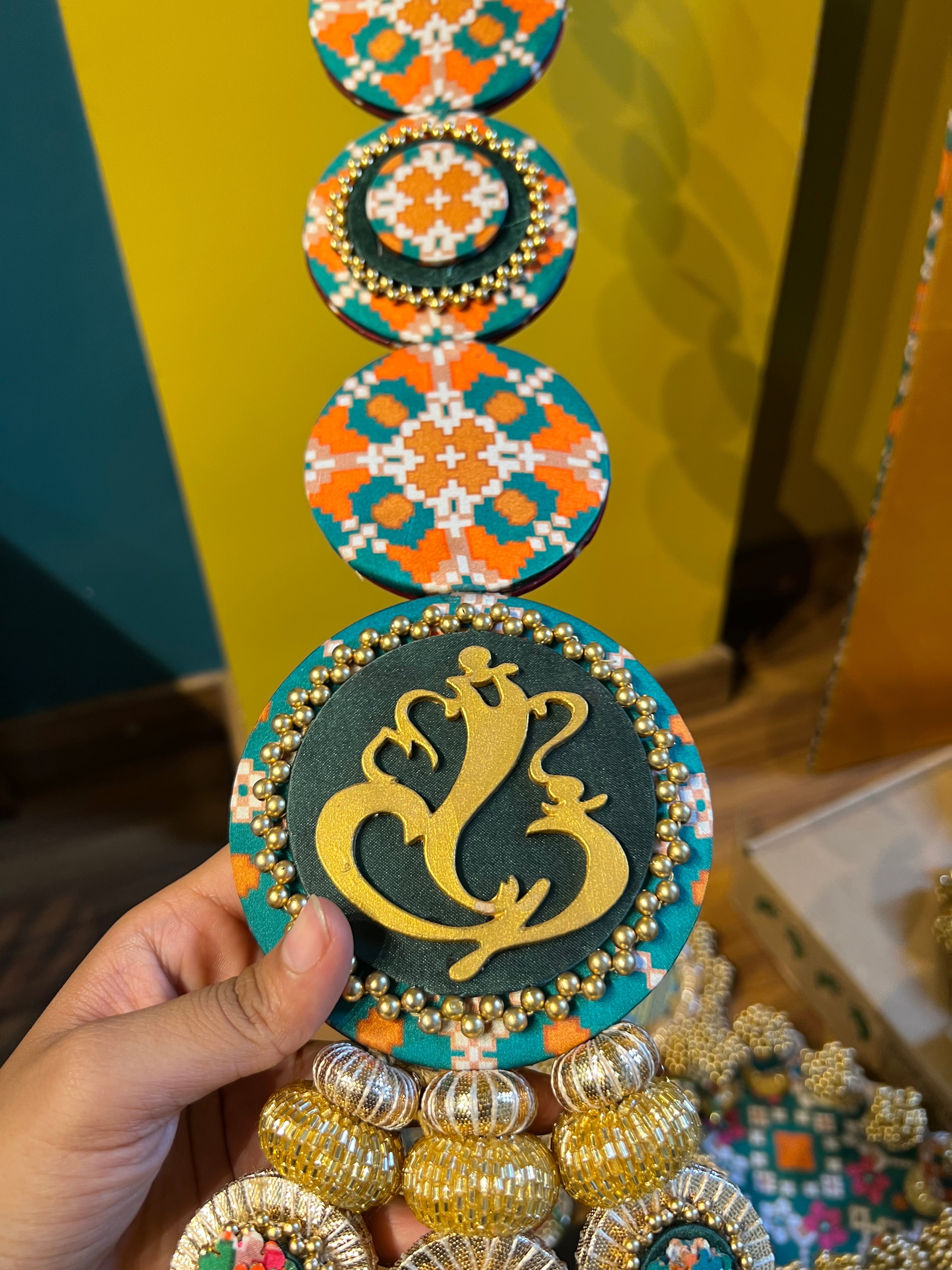 Dangler Ganesh Hanging: Bottle Green & Maroon Navratna Patola