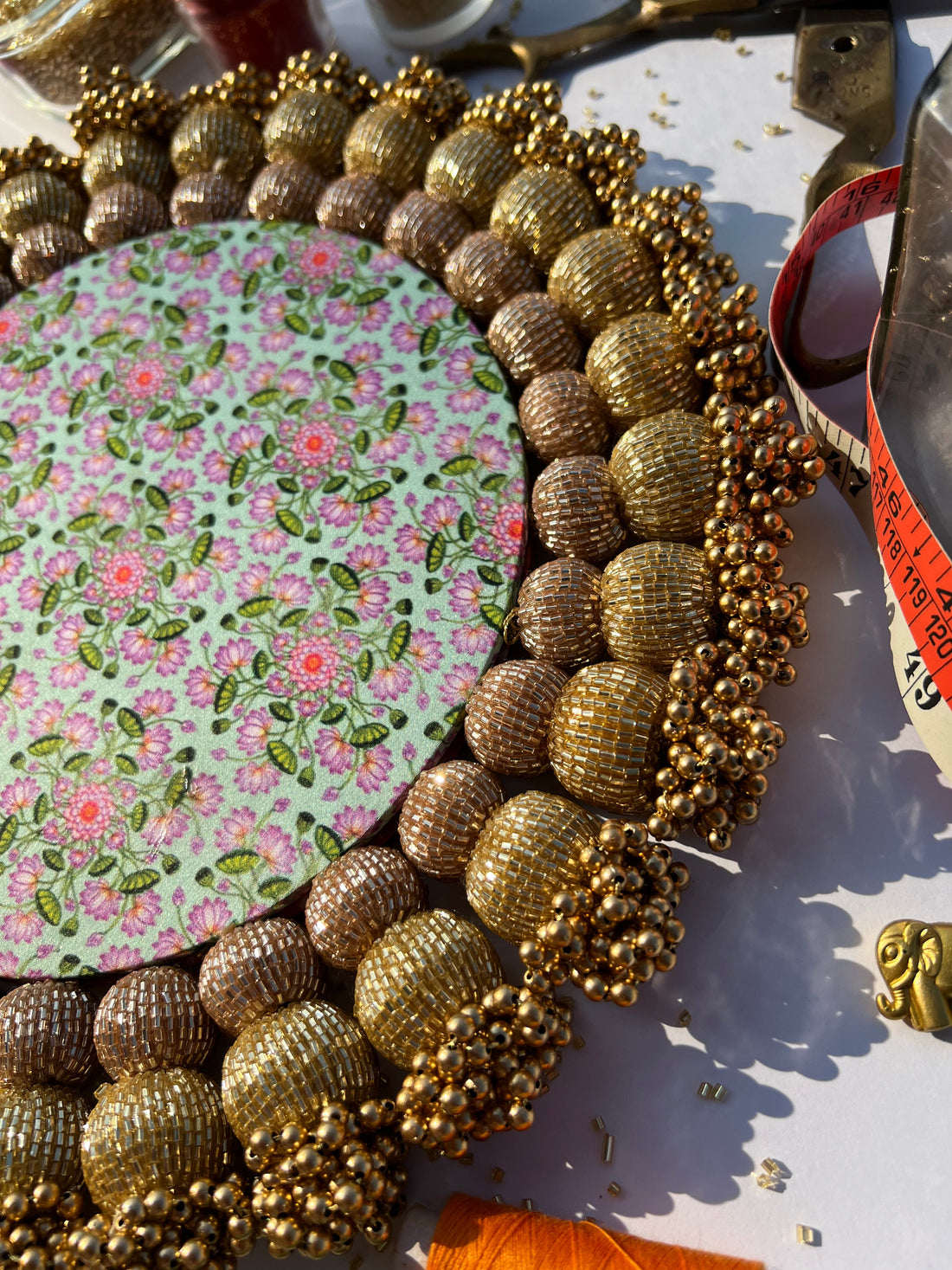 Spherical Chaandbali Pastel Pistachio Inflorescence Divine Pichwai and Pink Navratna Patola Rangoli