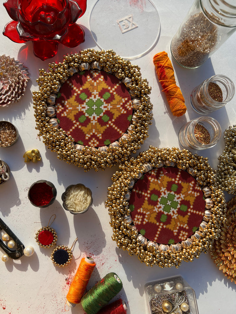 Bottle Green Navratna Patola & Upended Confluence Intense Ajrakh Beaded Shubh Labh Platters- Set of two