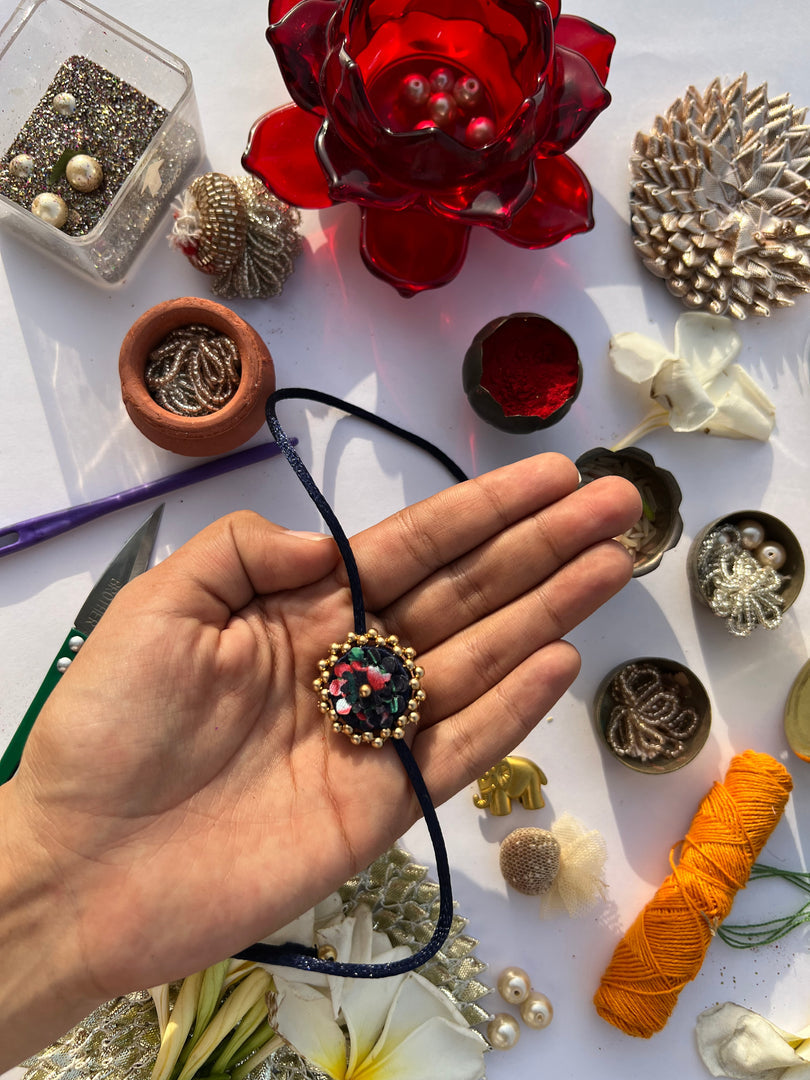 Maroon Navratna Patola Mini Beaded Enchanted Rakhi