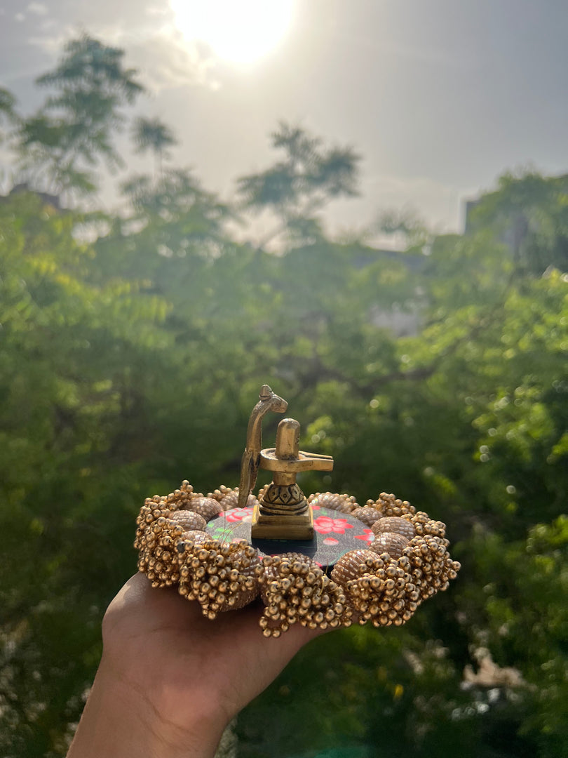 Spherical Mini Platter: Flare Mor Bani Thangat Kare + Pastel Pistachio Inflorescence Divine Pichwai