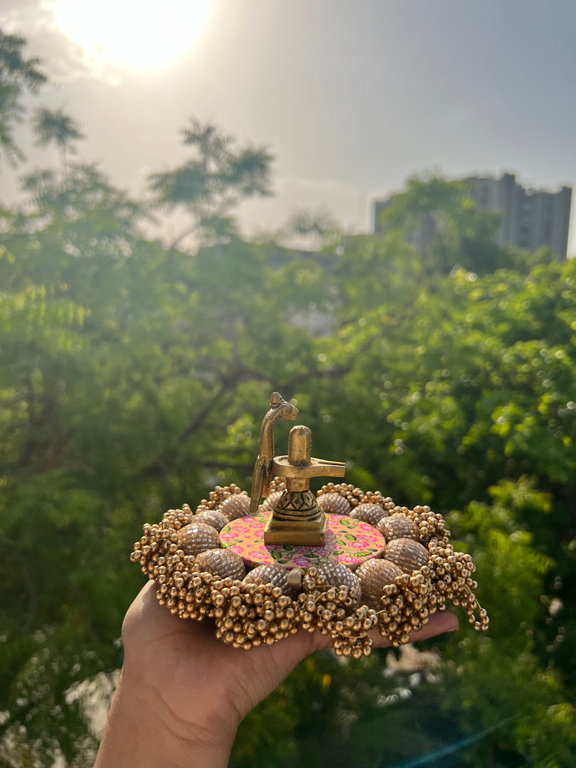 Spherical Mini Platter: Flare Mor Bani Thangat Kare + Pastel Pistachio Inflorescence Divine Pichwai