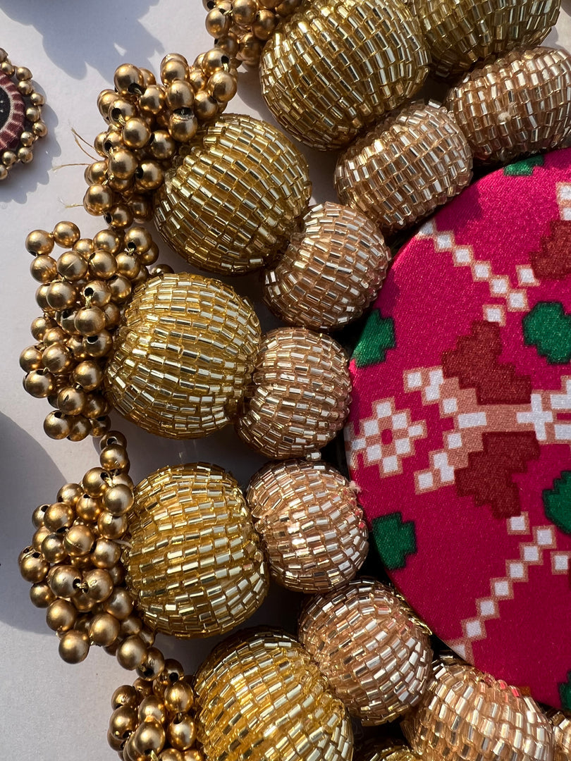 Spherical Chaandbali OG Inflorescence Divine Pichwai and Maroon Navratna Patola Diya Pallet
