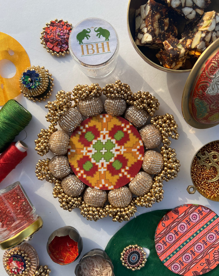 Spherical Mini Platter: Flare Mor Bani Thangat Kare + Pastel Pistachio Inflorescence Divine Pichwai
