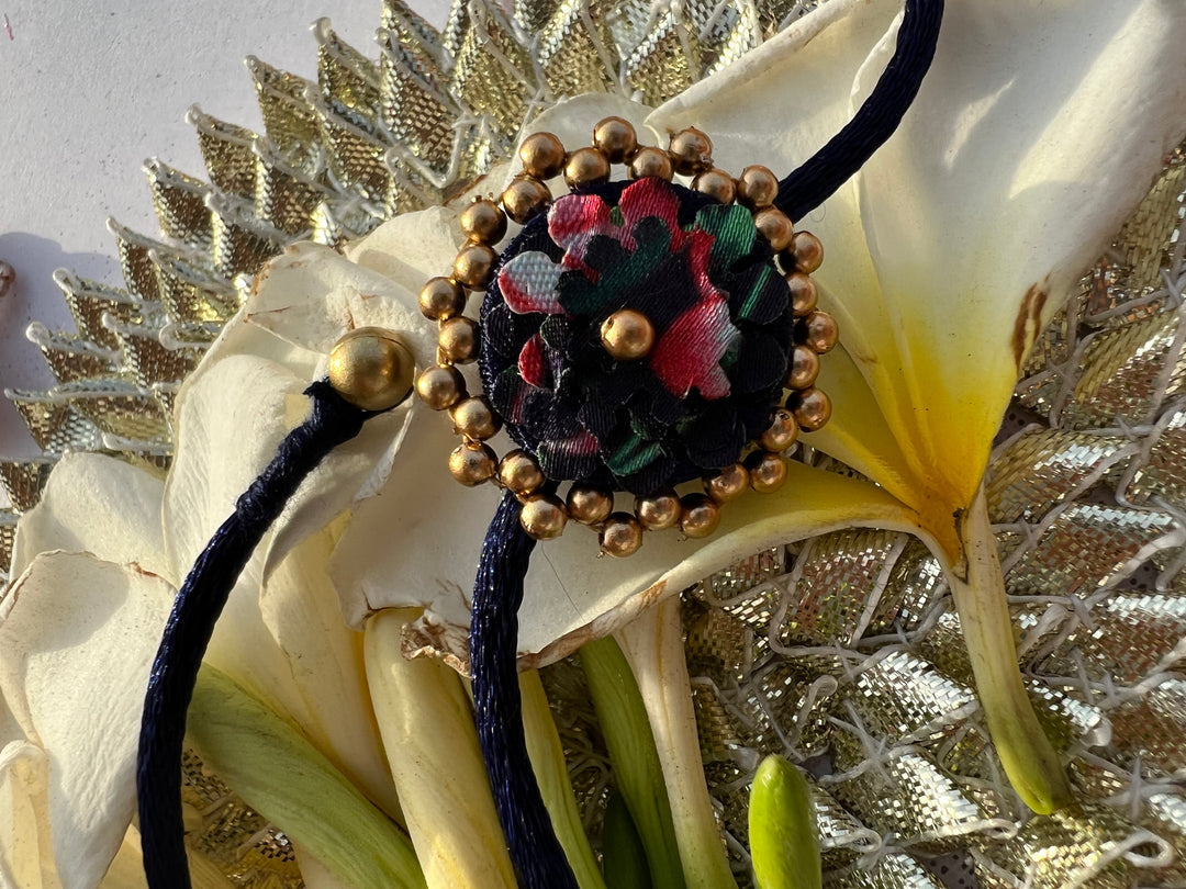 Maroon Navratna Patola Mini Beaded Enchanted Rakhi