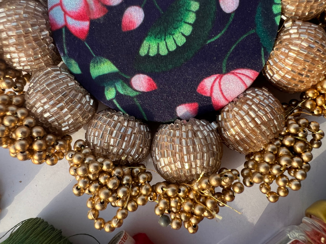 Spherical Mini Platter: Flare Mor Bani Thangat Kare + Pastel Pistachio Inflorescence Divine Pichwai