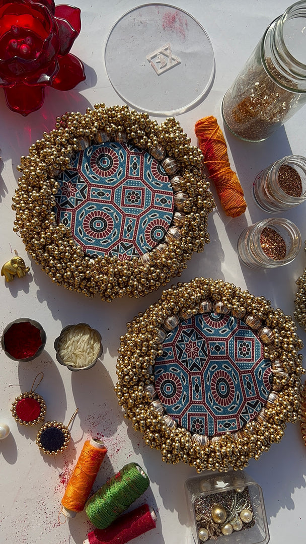 Bottle Green Navratna Patola & Upended Confluence Intense Ajrakh Beaded Shubh Labh Platters- Set of two