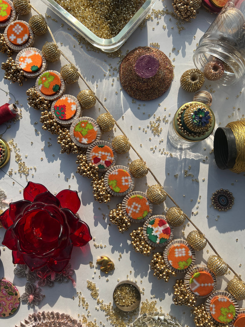 The Ready To Glam Vermillion + Yellow Congruous Divine Pichwai Glass Lumba Toran (Flexible)