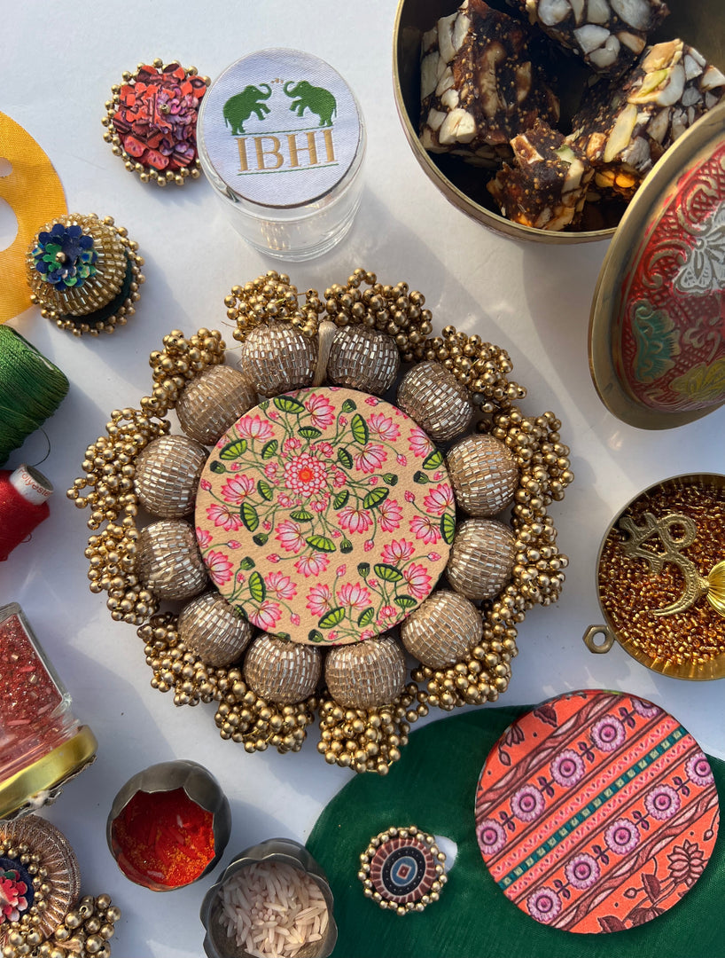 Spherical Mini Platter: Flare Mor Bani Thangat Kare + Pastel Pistachio Inflorescence Divine Pichwai