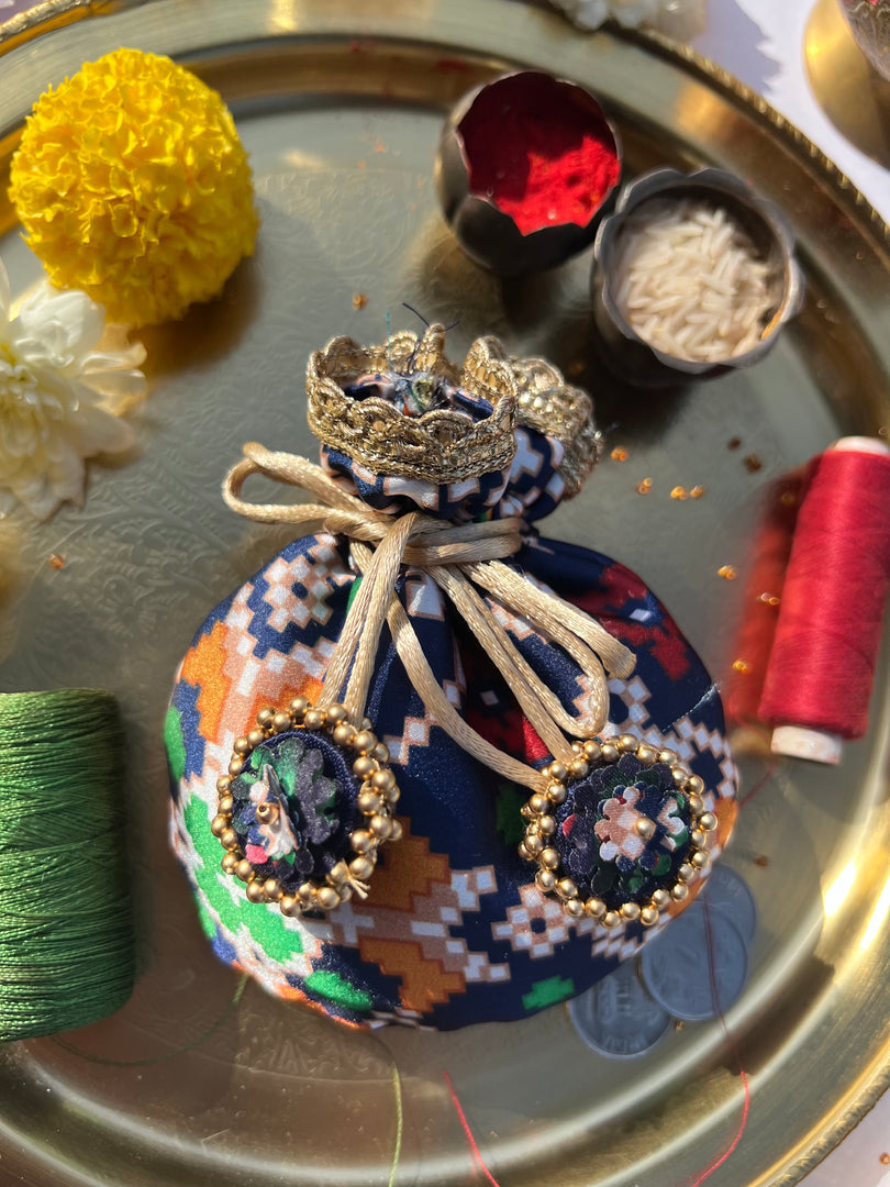 Idiosyncratic Divine Pichwai Little Potli- शगुन wali
