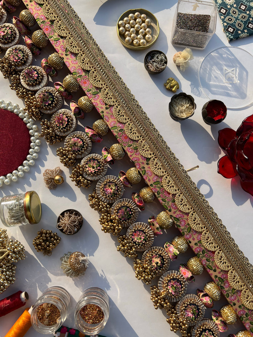 SLEEK: Maroon & Bottle Green Navratna Patola Plumeria Toran (SOLID)