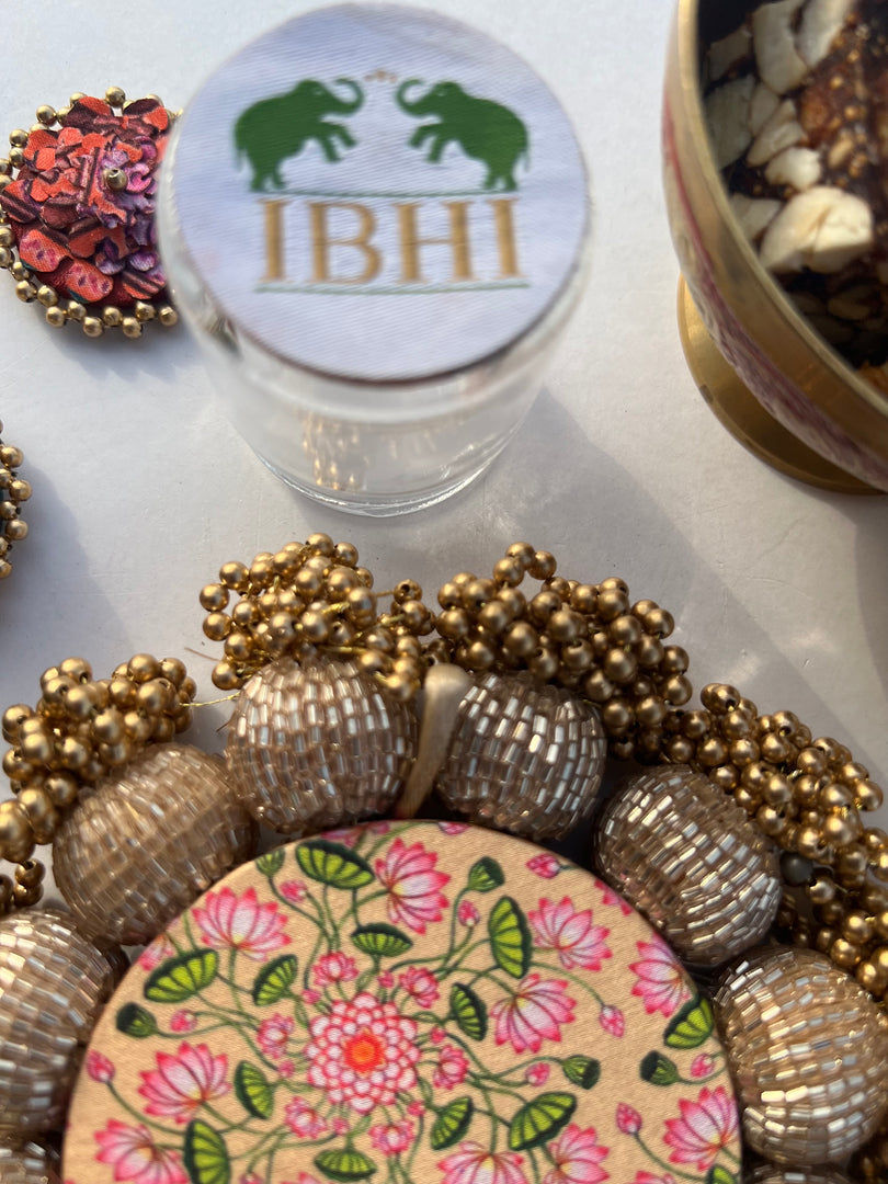 Spherical Mini Platter: Flare Mor Bani Thangat Kare + Pastel Pistachio Inflorescence Divine Pichwai