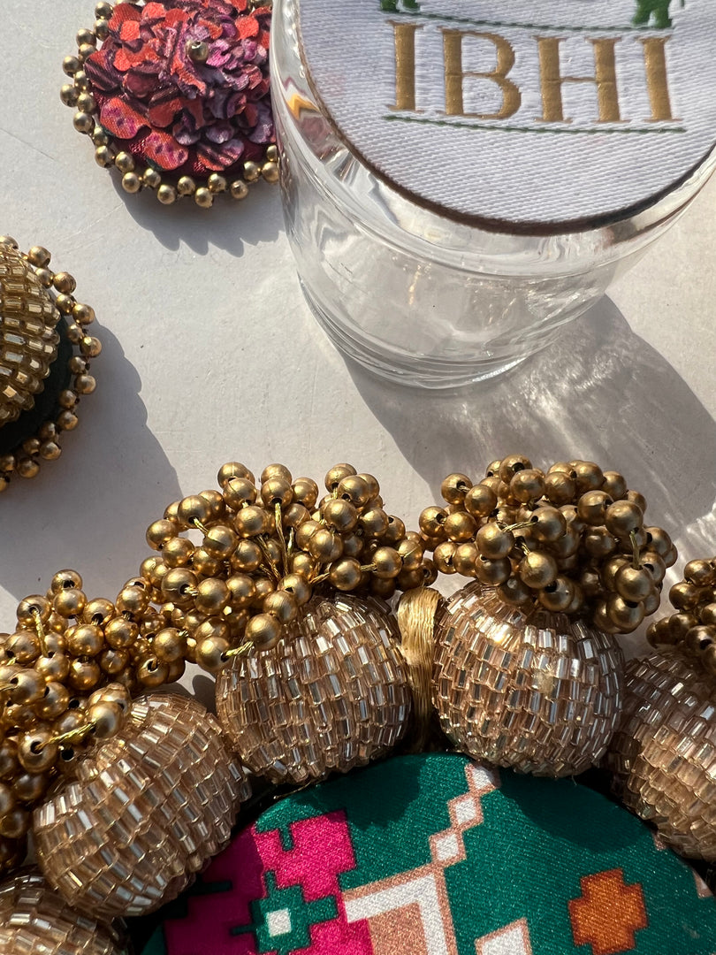 Spherical Mini Platter: Flare Mor Bani Thangat Kare + Pastel Pistachio Inflorescence Divine Pichwai