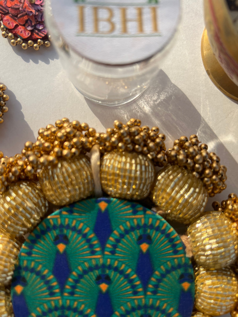 Spherical Mini Platter: Quill Mor Bani Thangat Kare + Bottle Green Navratna Patola