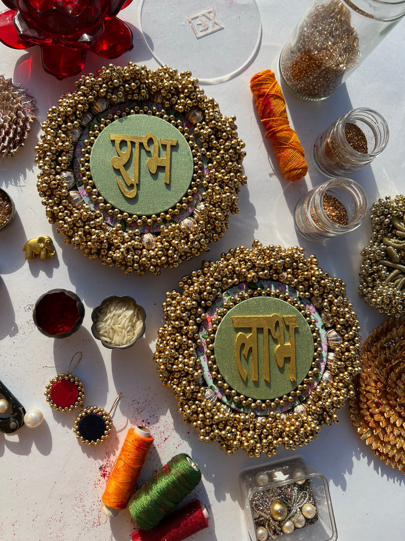 Bottle Green Navratna Patola & Upended Confluence Intense Ajrakh Beaded Shubh Labh Platters- Set of two