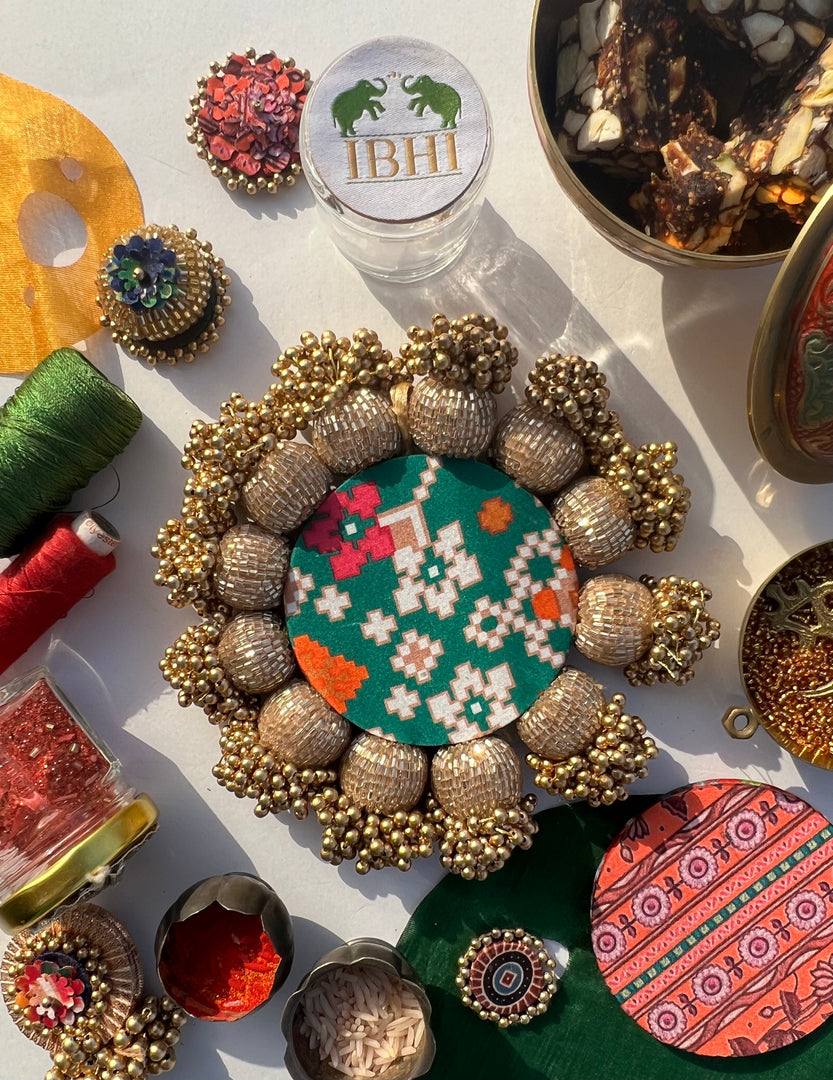 Spherical Mini Platter: Flare Mor Bani Thangat Kare + Pastel Pistachio Inflorescence Divine Pichwai