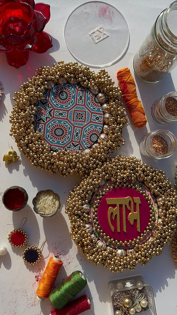 Bottle Green Navratna Patola & Upended Confluence Intense Ajrakh Beaded Shubh Labh Platters- Set of two