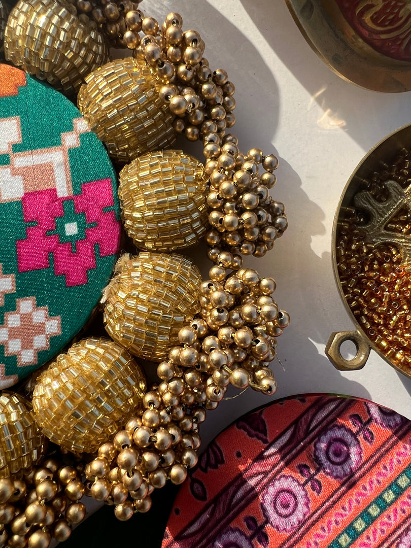 Spherical Mini Platter: Quill Mor Bani Thangat Kare + Bottle Green Navratna Patola