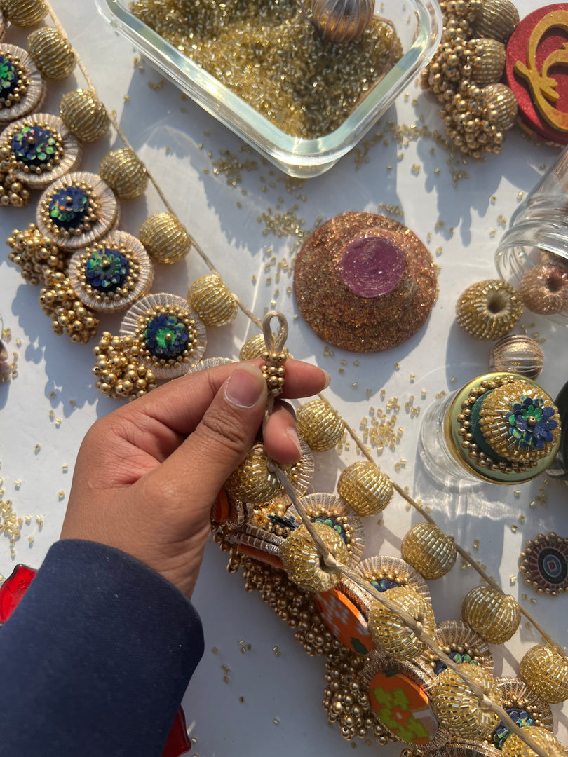 The Ready To Glam Vermillion + Yellow Congruous Divine Pichwai Glass Lumba Toran (Flexible)