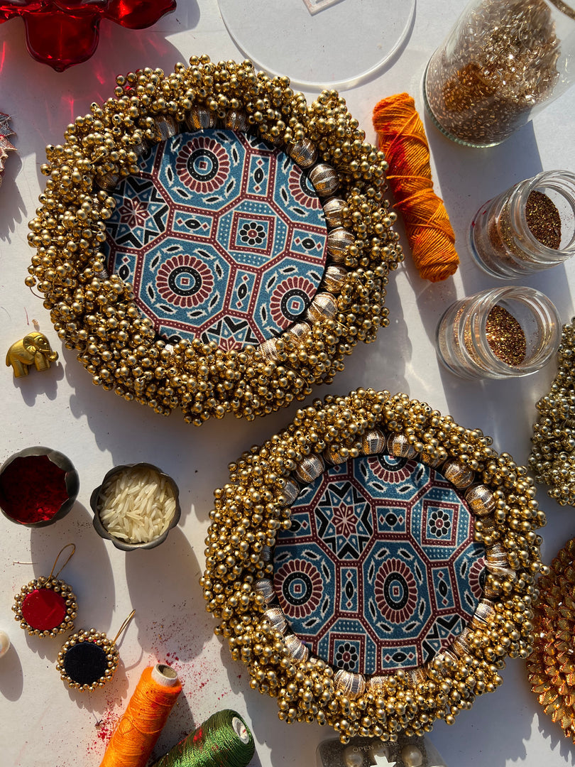 Bottle Green Navratna Patola & Upended Confluence Intense Ajrakh Beaded Shubh Labh Platters- Set of two