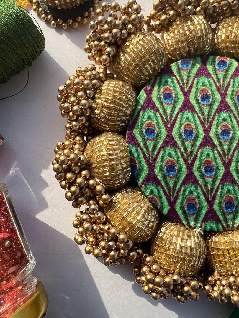 Spherical Mini Platter: Quill Mor Bani Thangat Kare + Bottle Green Navratna Patola
