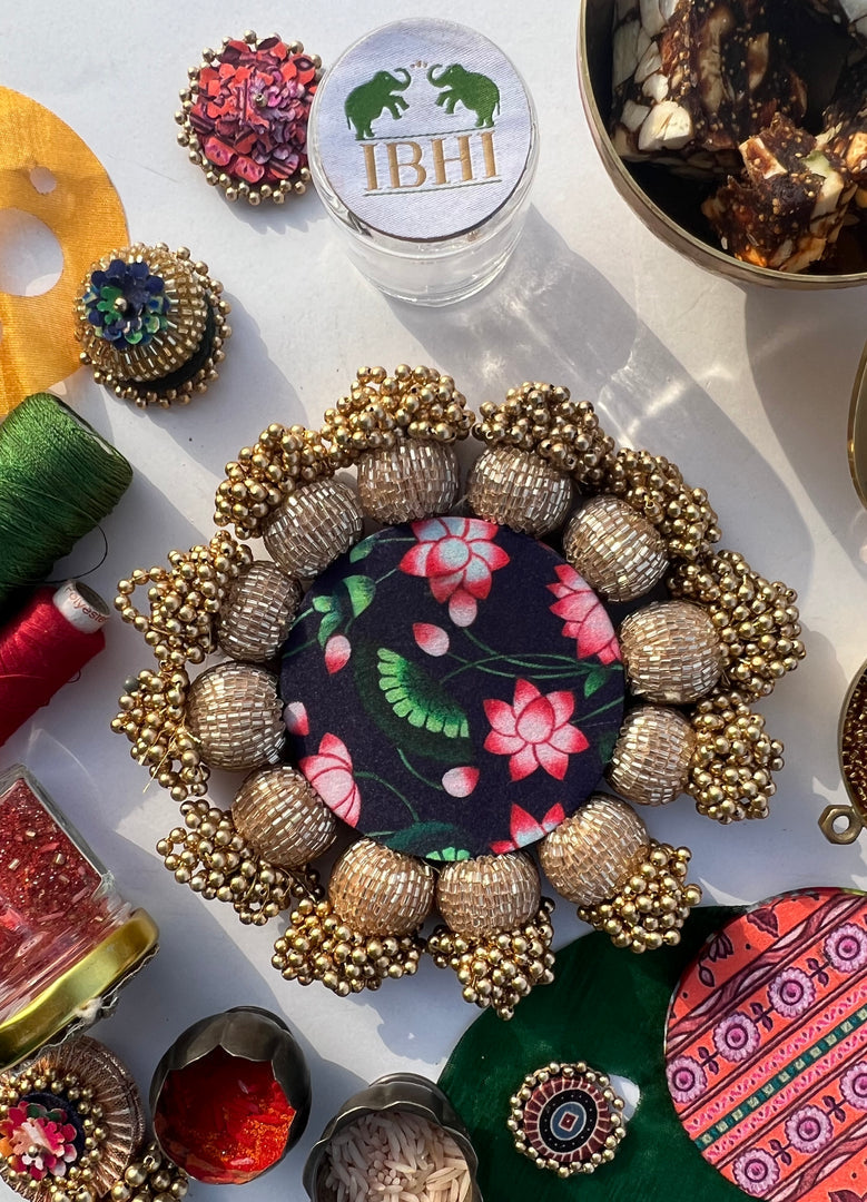 Spherical Mini Platter: Flare Mor Bani Thangat Kare + Pastel Pistachio Inflorescence Divine Pichwai