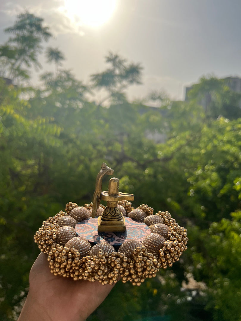 Spherical Mini Platter: Flare Mor Bani Thangat Kare + Pastel Pistachio Inflorescence Divine Pichwai