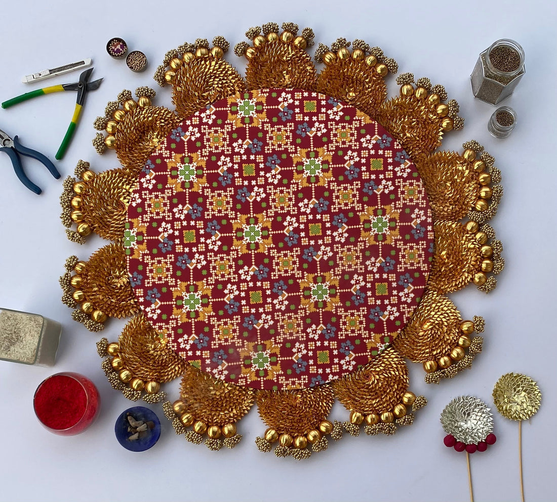 The Maroon Navratna Gota Scallop Rangoli