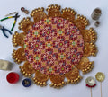 The Maroon Navratna Gota Scallop Rangoli