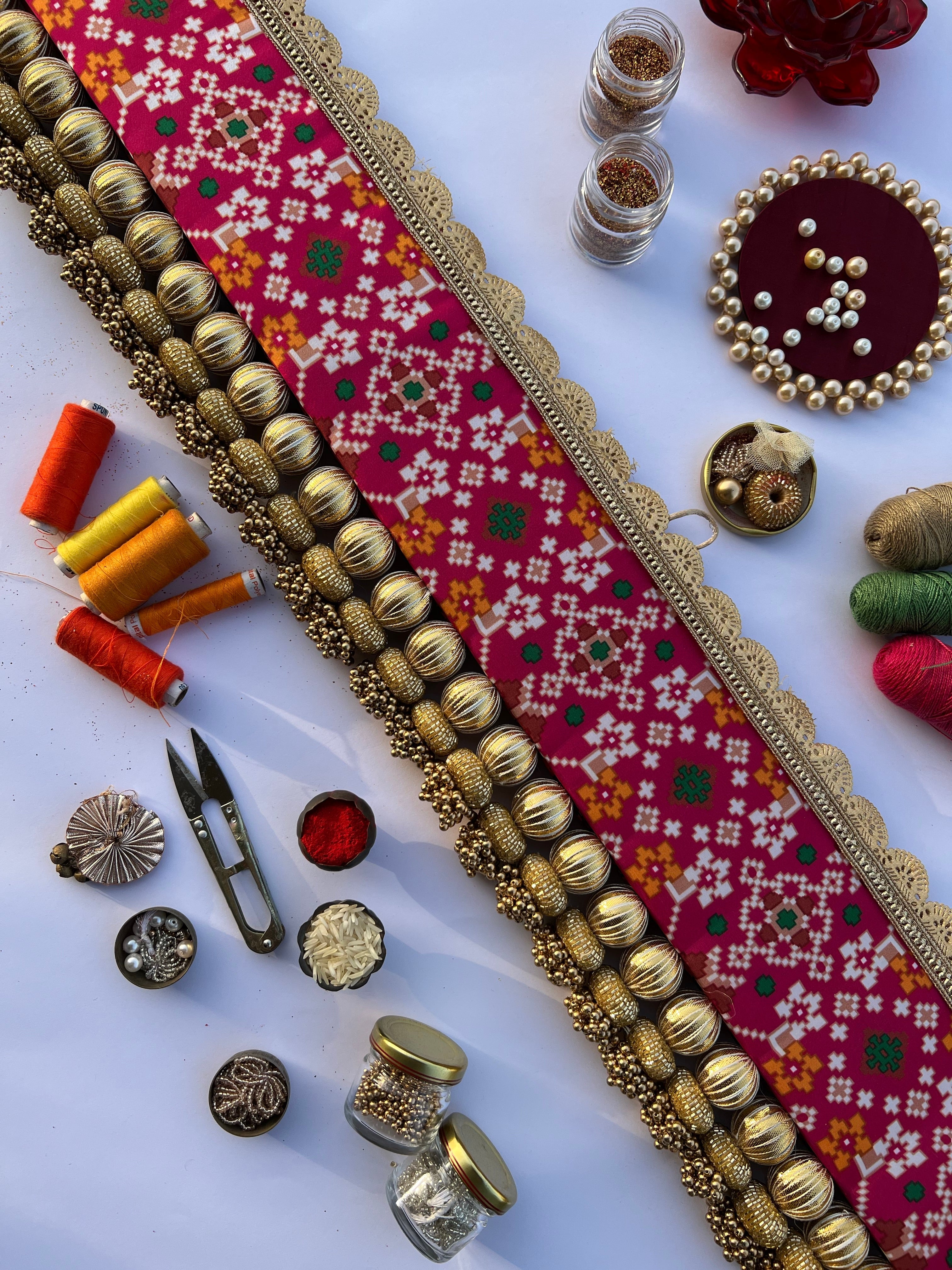 Vermillion Congruous Divine Pichwai and Pink Navratna Patola Tasseled Toran