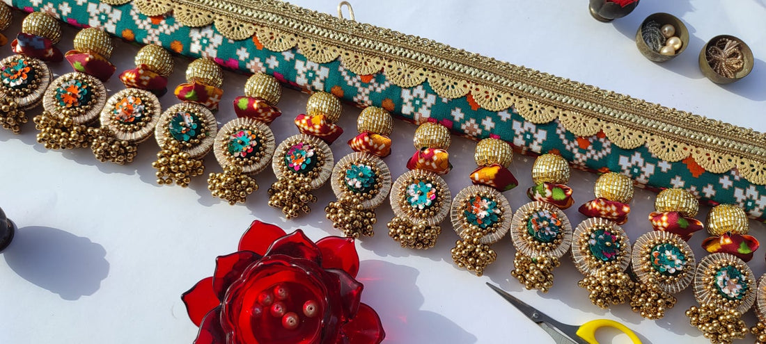 SLEEK: Maroon & Bottle Green Navratna Patola Plumeria Toran (SOLID)
