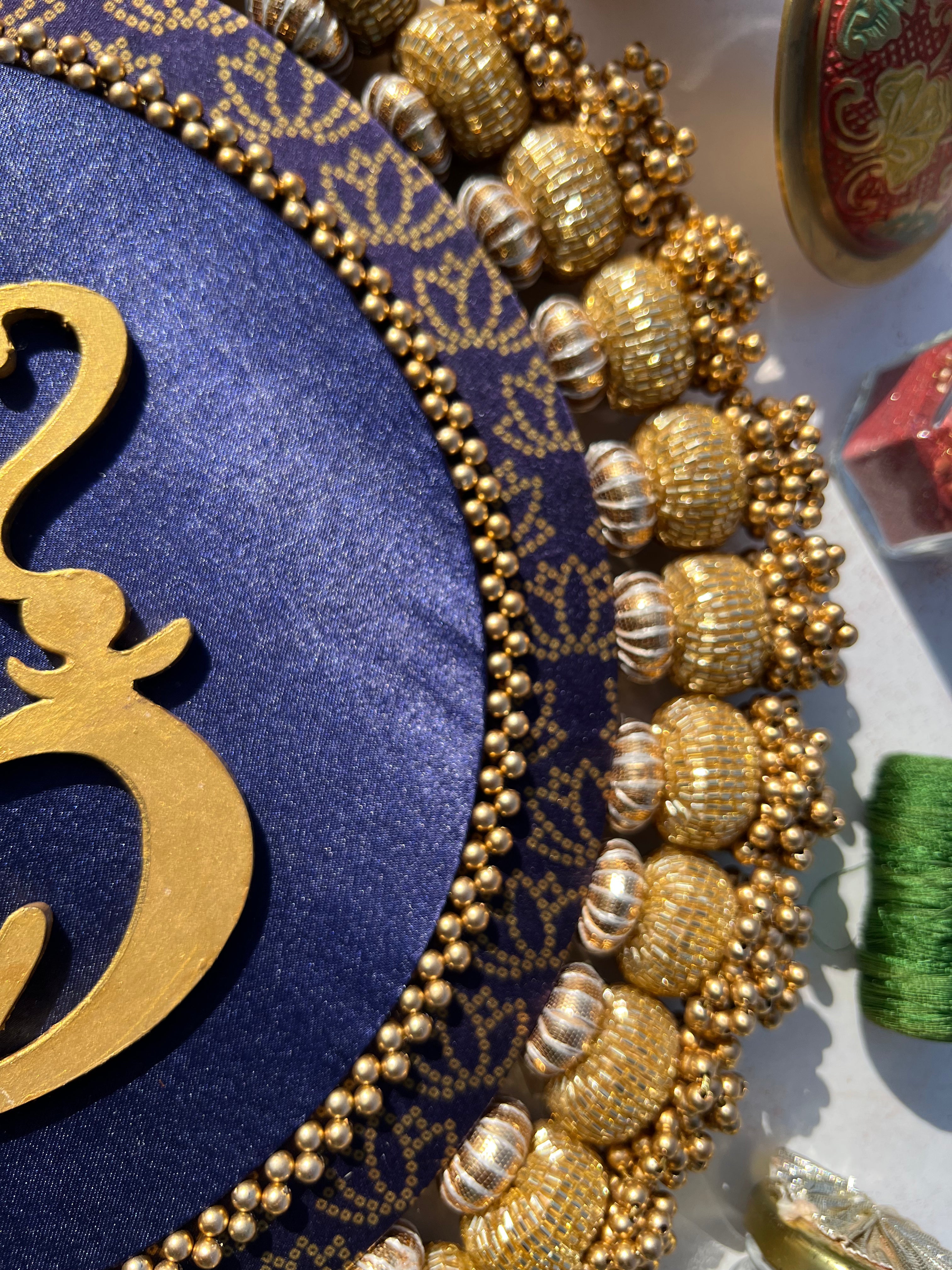 Ganesh Motif Platter + Hanging: Kamal Bandhej + Bottle Green Navratna Patola