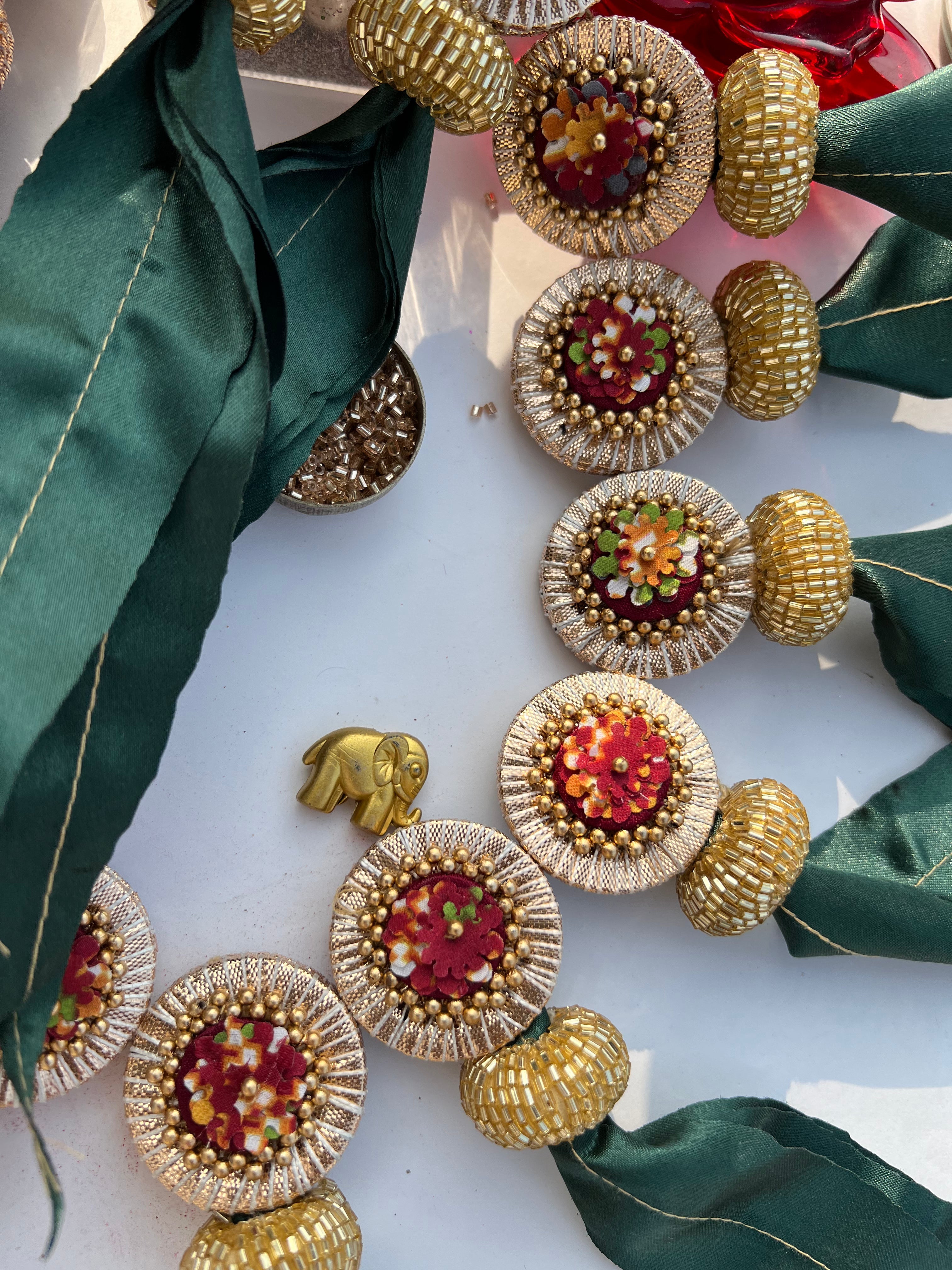TWO WAY: Enchanted Maroon & Bottle Green Navratna Patola  Asopalav Toran (FLEXIBLE)