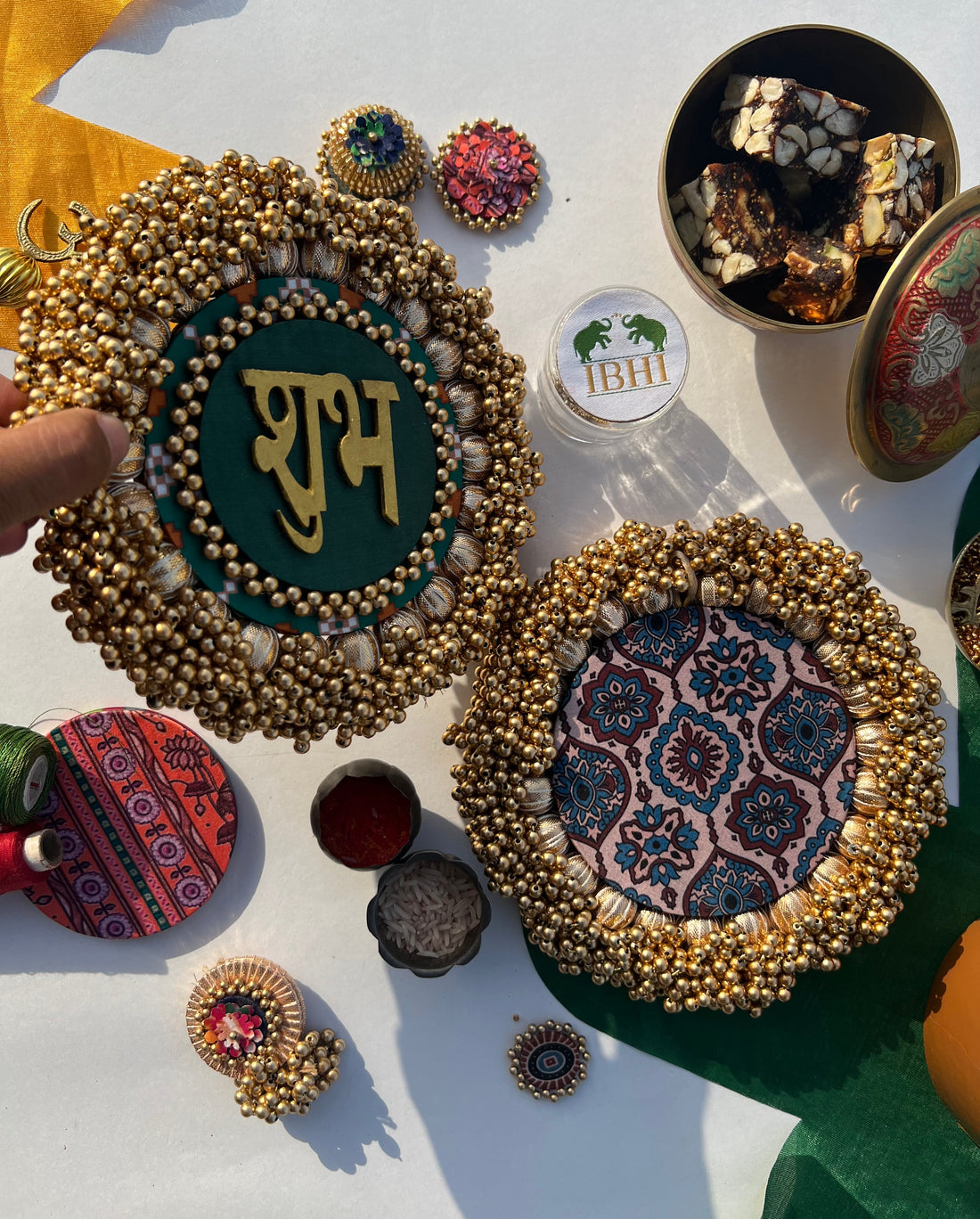 Bottle Green Navratna Patola & Upended Confluence Intense Ajrakh Beaded Shubh Labh Platters- Set of two
