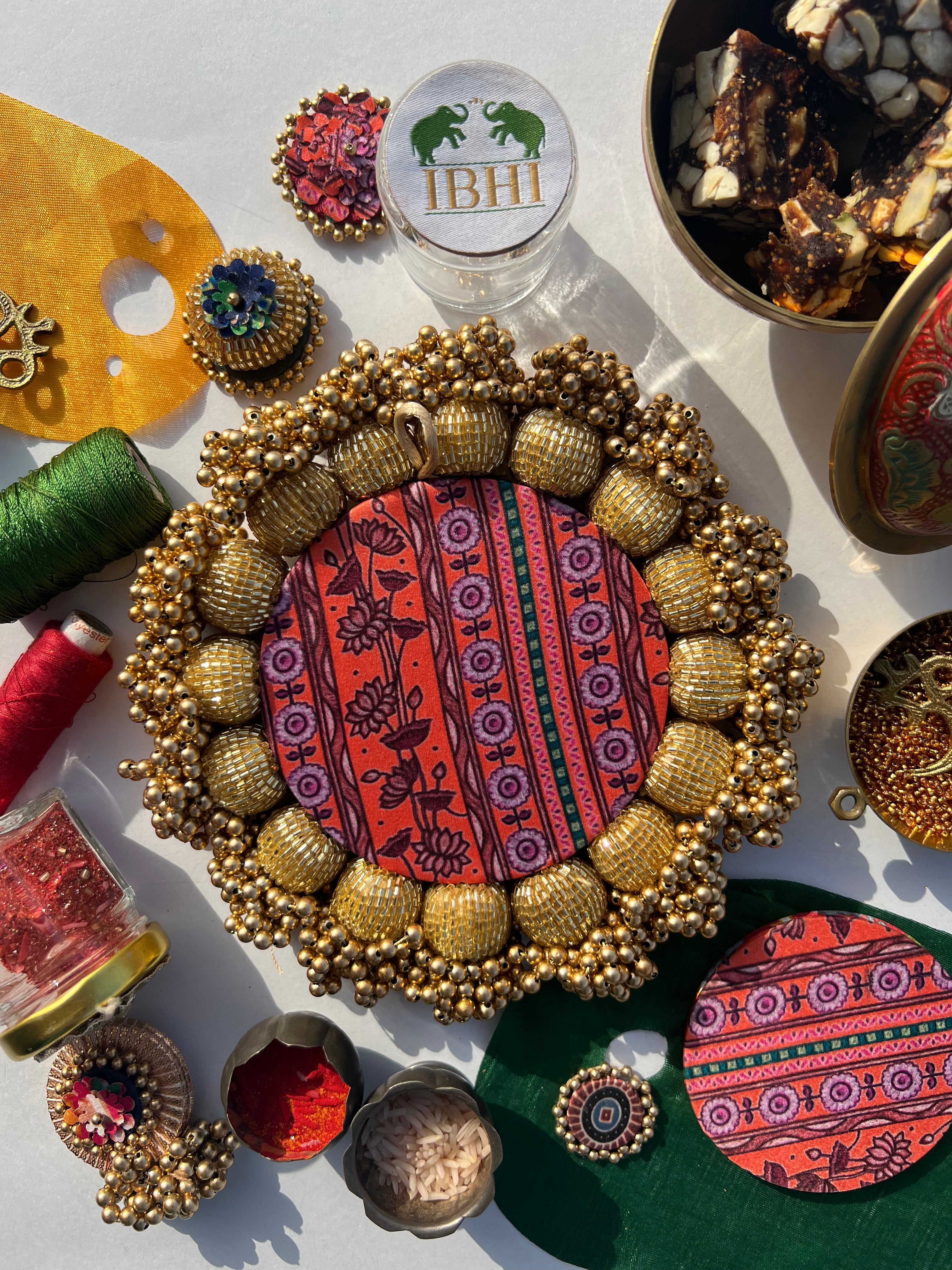 SPHERICAL GANESH Platter: Bottle Green Navratna Patola + Vermillion Congruous Divine Pichwai