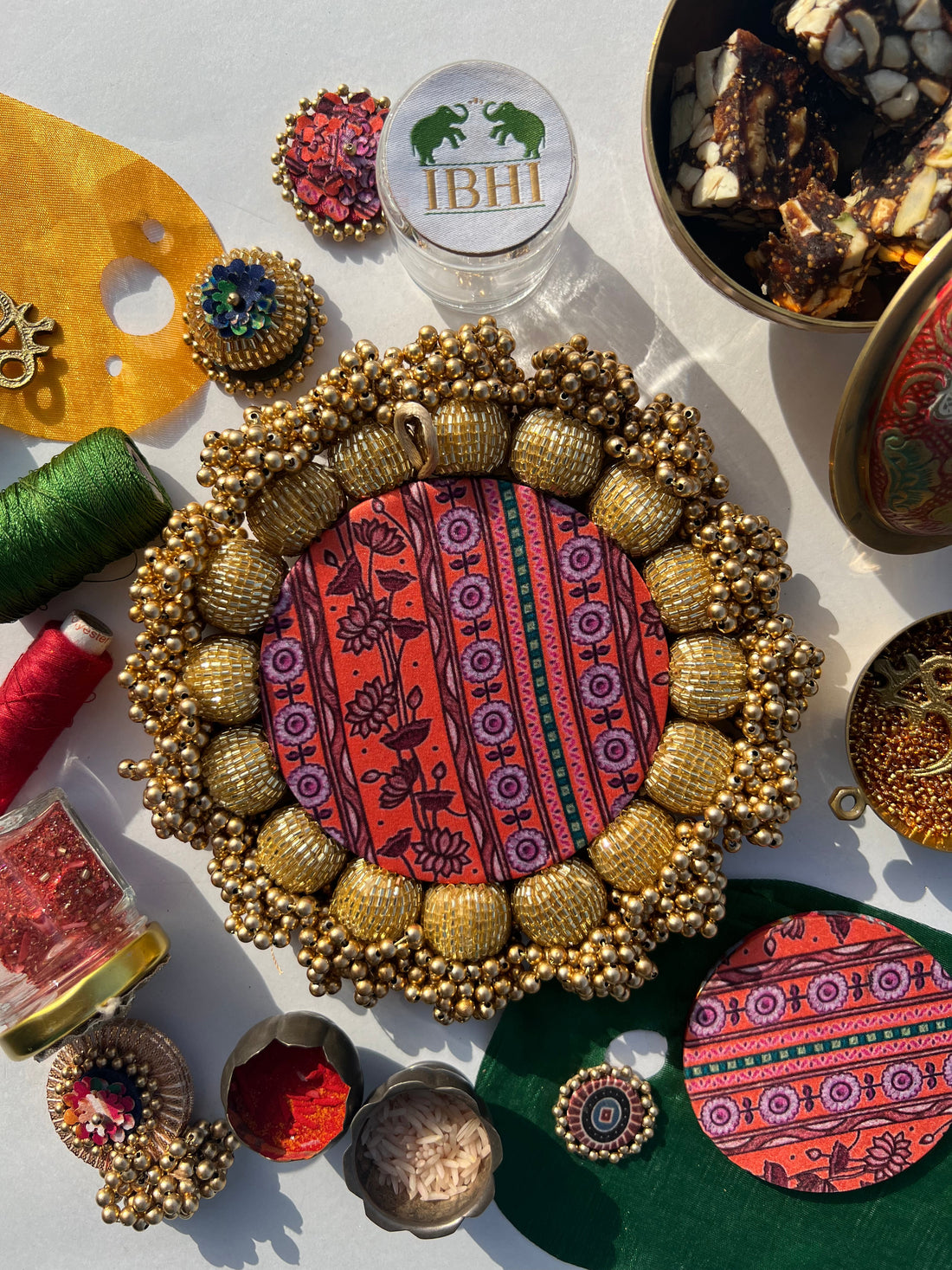 SPHERICAL GANESH Platter: Bottle Green Navratna Patola + Vermillion Congruous Divine Pichwai