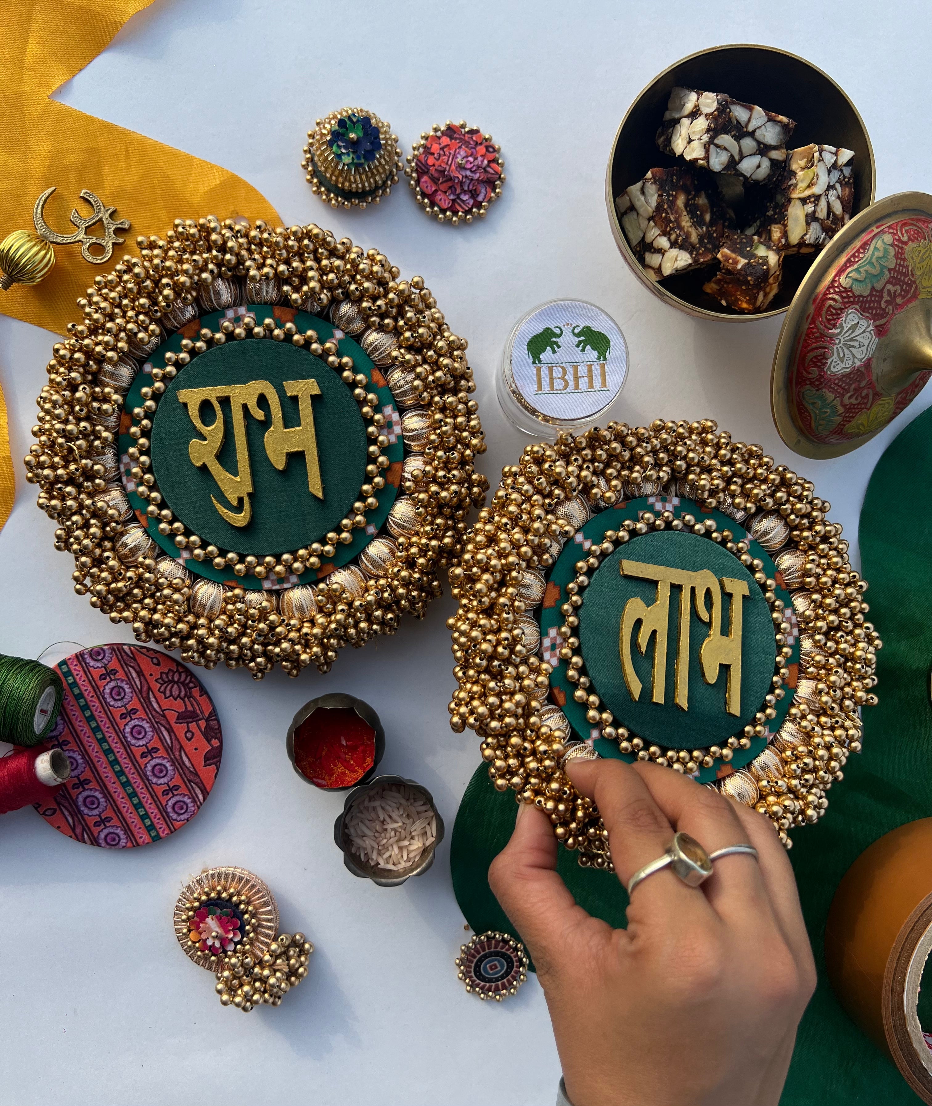 Bottle Green Navratna Patola & Upended Confluence Intense Ajrakh Beaded Shubh Labh Platters- Set of two