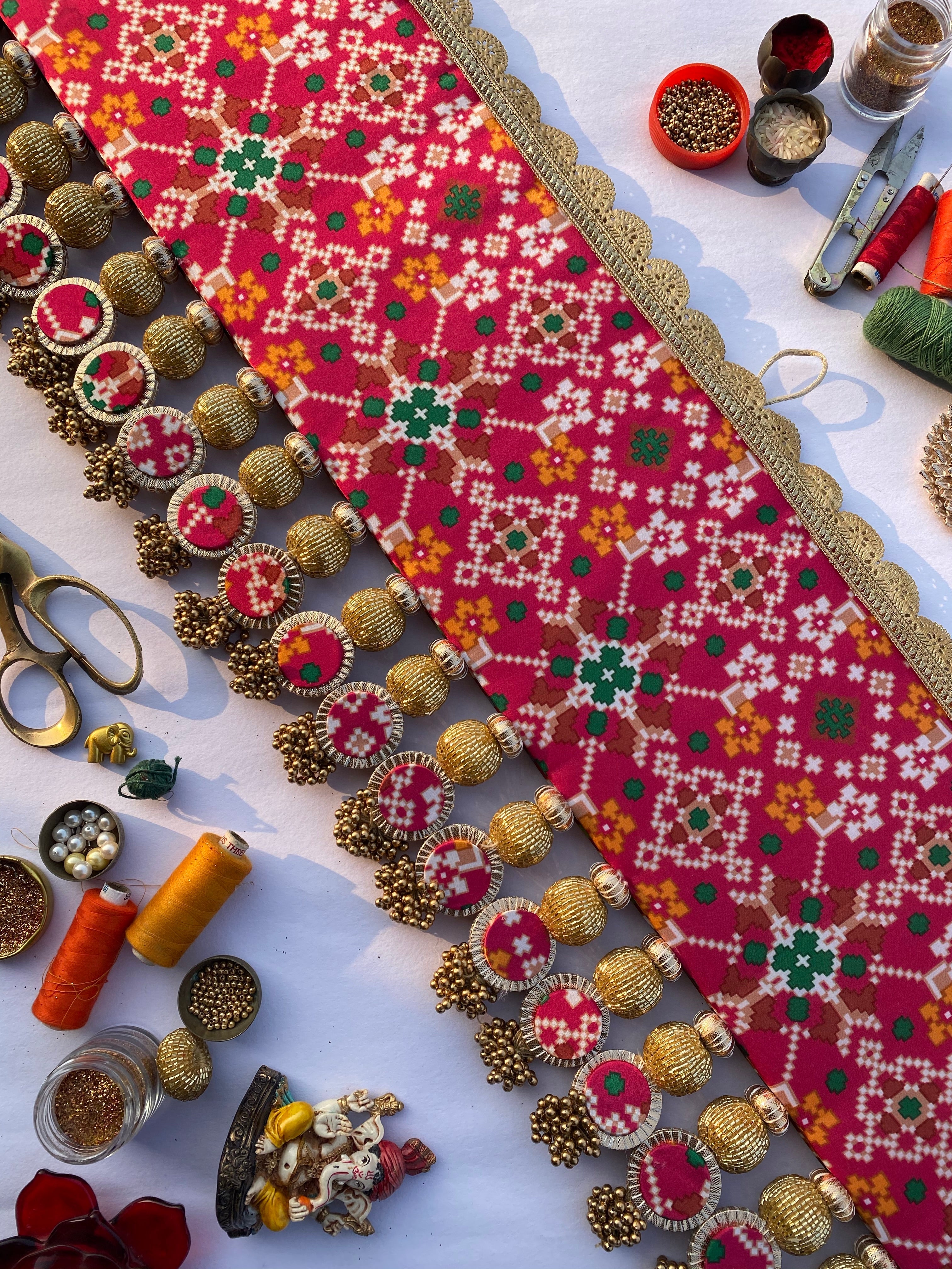 Chic-O-Fleek Sleek Toran : Maroon & Pink Navratna Patola X Glass Rhapsody Toran
