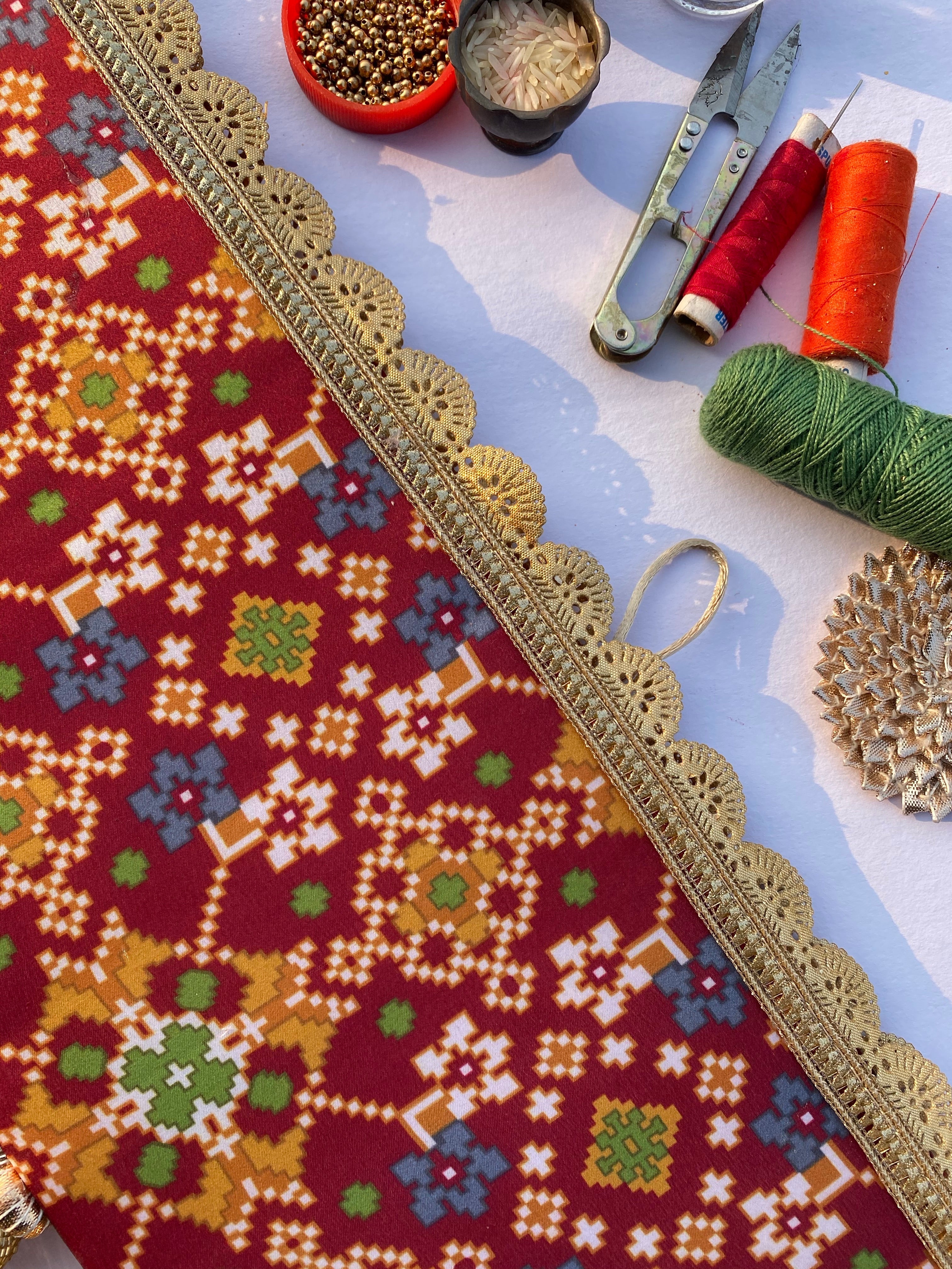 Chic-O-Fleek Sleek Toran : Maroon & Pink Navratna Patola X Glass Rhapsody Toran