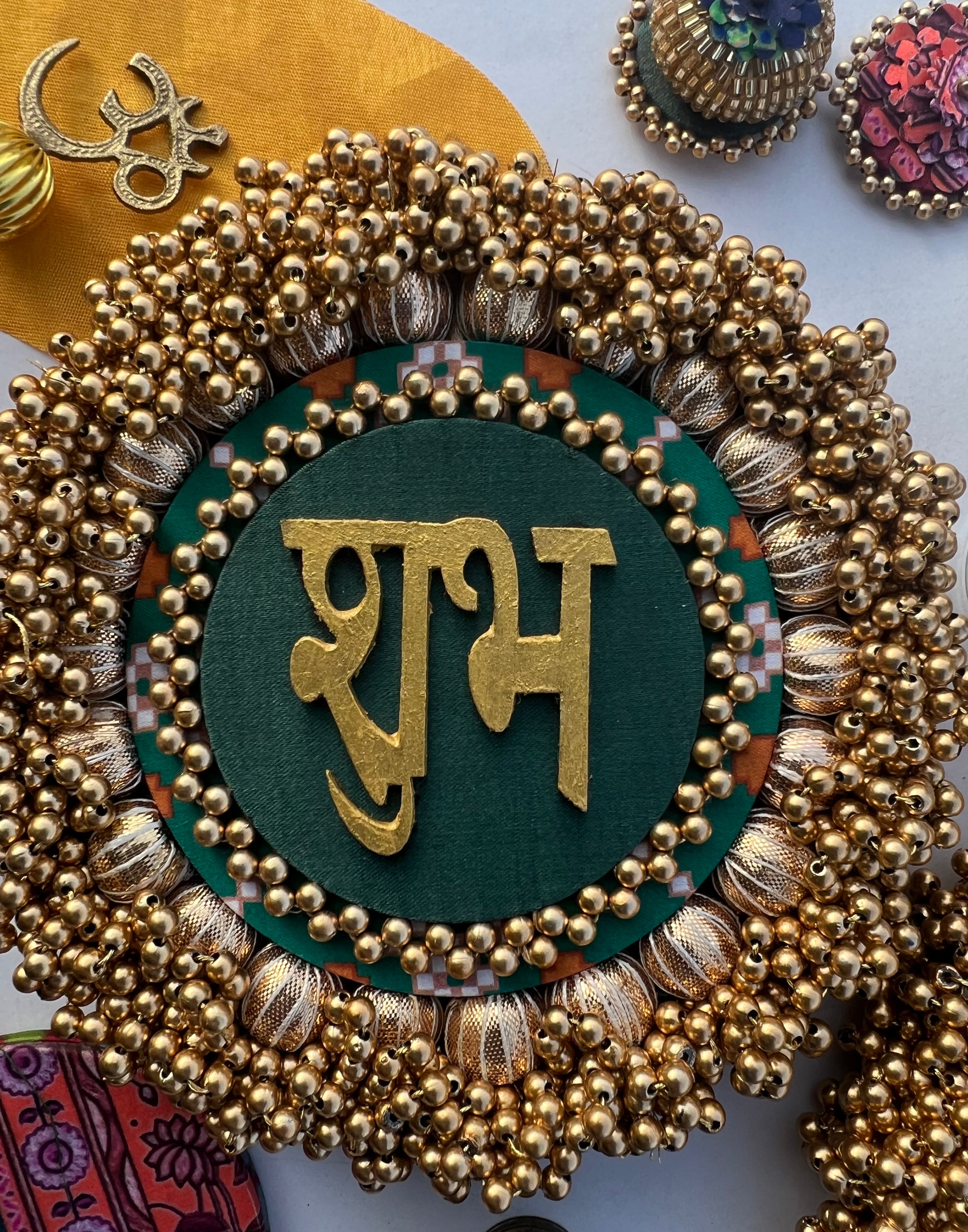 Bottle Green Navratna Patola & Upended Confluence Intense Ajrakh Beaded Shubh Labh Platters- Set of two
