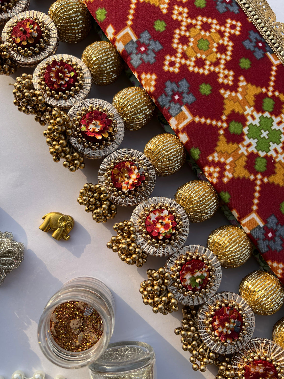 Spherical Enchanted Lumba: Maroon Navratna Patola & Pastel Pistachio Inflorescence Divine Pichwai Two Way Toran