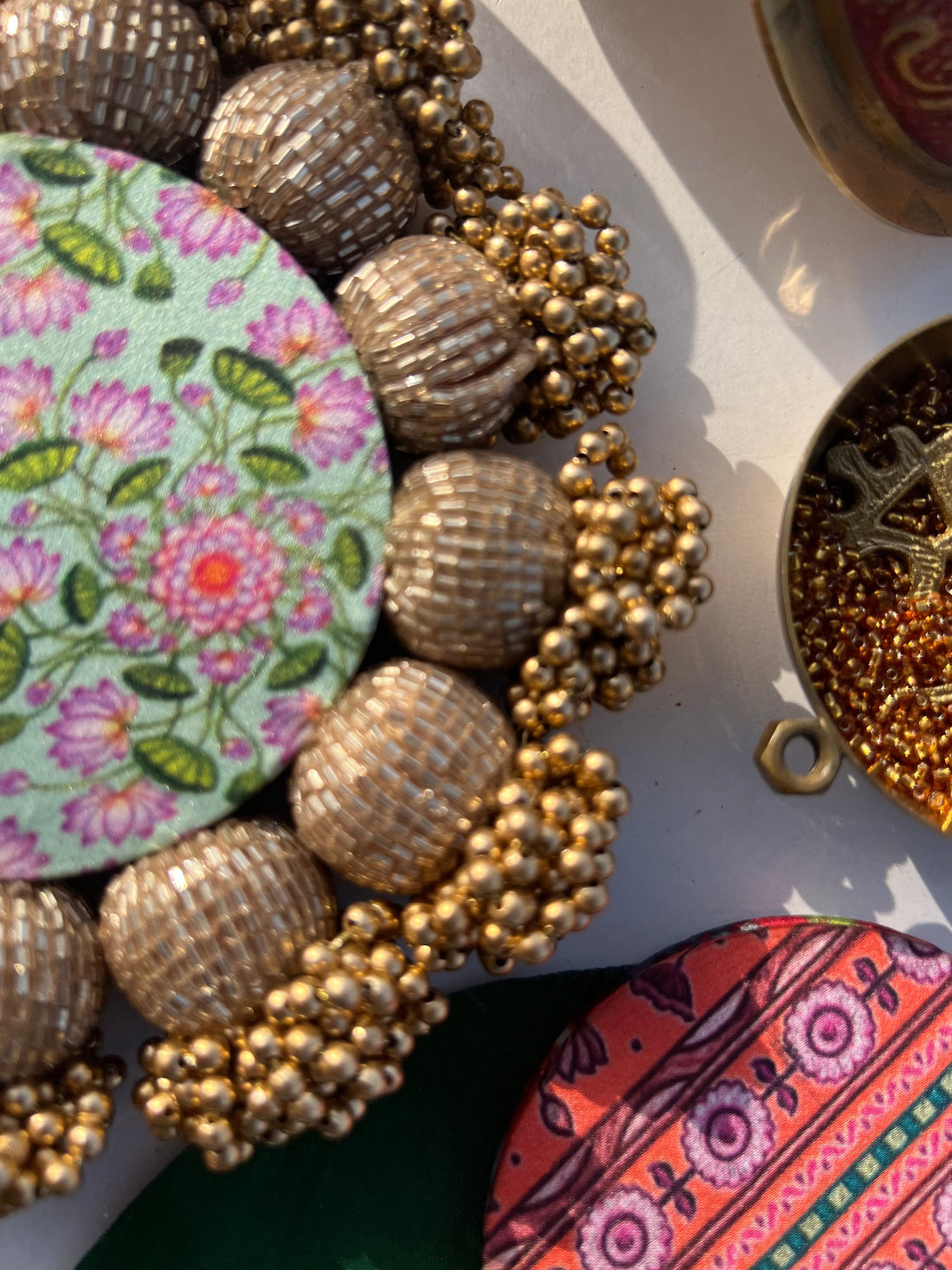 Spherical Mini Platter: Flare Mor Bani Thangat Kare + Pastel Pistachio Inflorescence Divine Pichwai