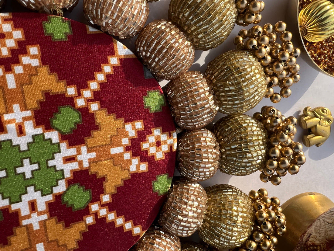 Spherical Chaandbali OG Inflorescence Divine Pichwai and Maroon Navratna Patola Diya Pallet