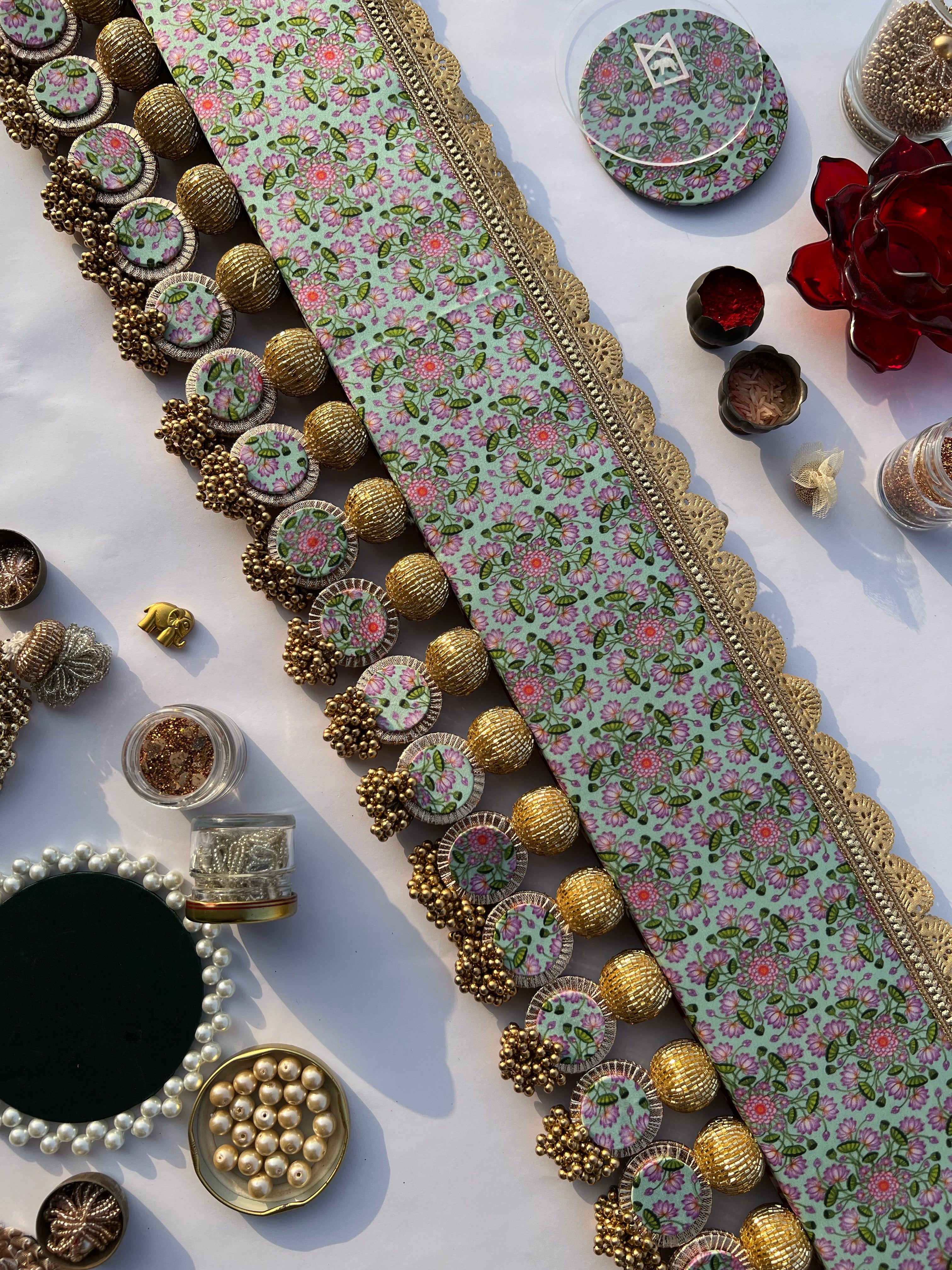 Spherical Enchanted Lumba: Maroon Navratna Patola & Pastel Pistachio Inflorescence Divine Pichwai Two Way Toran