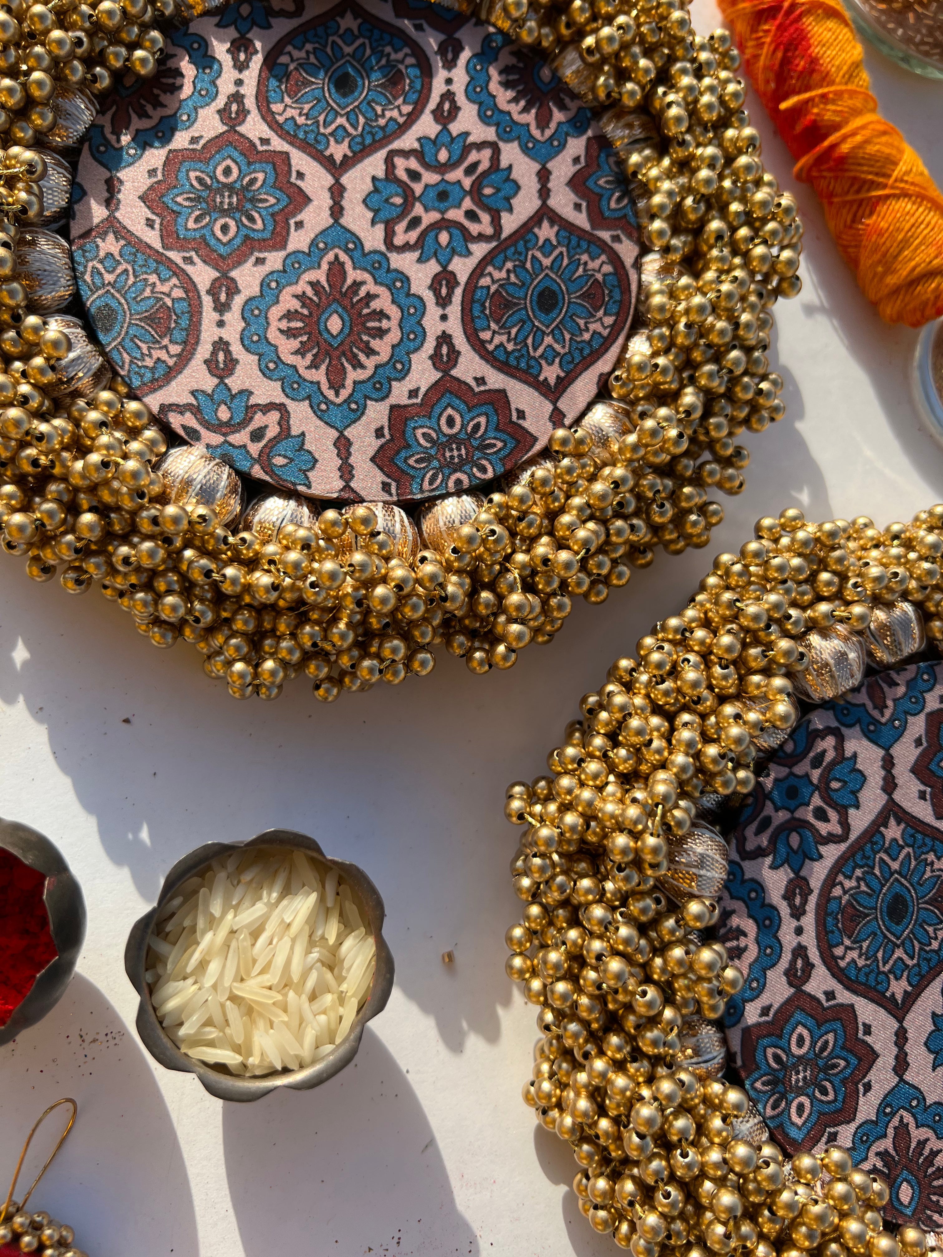 Bottle Green Navratna Patola & Upended Confluence Intense Ajrakh Beaded Shubh Labh Platters- Set of two