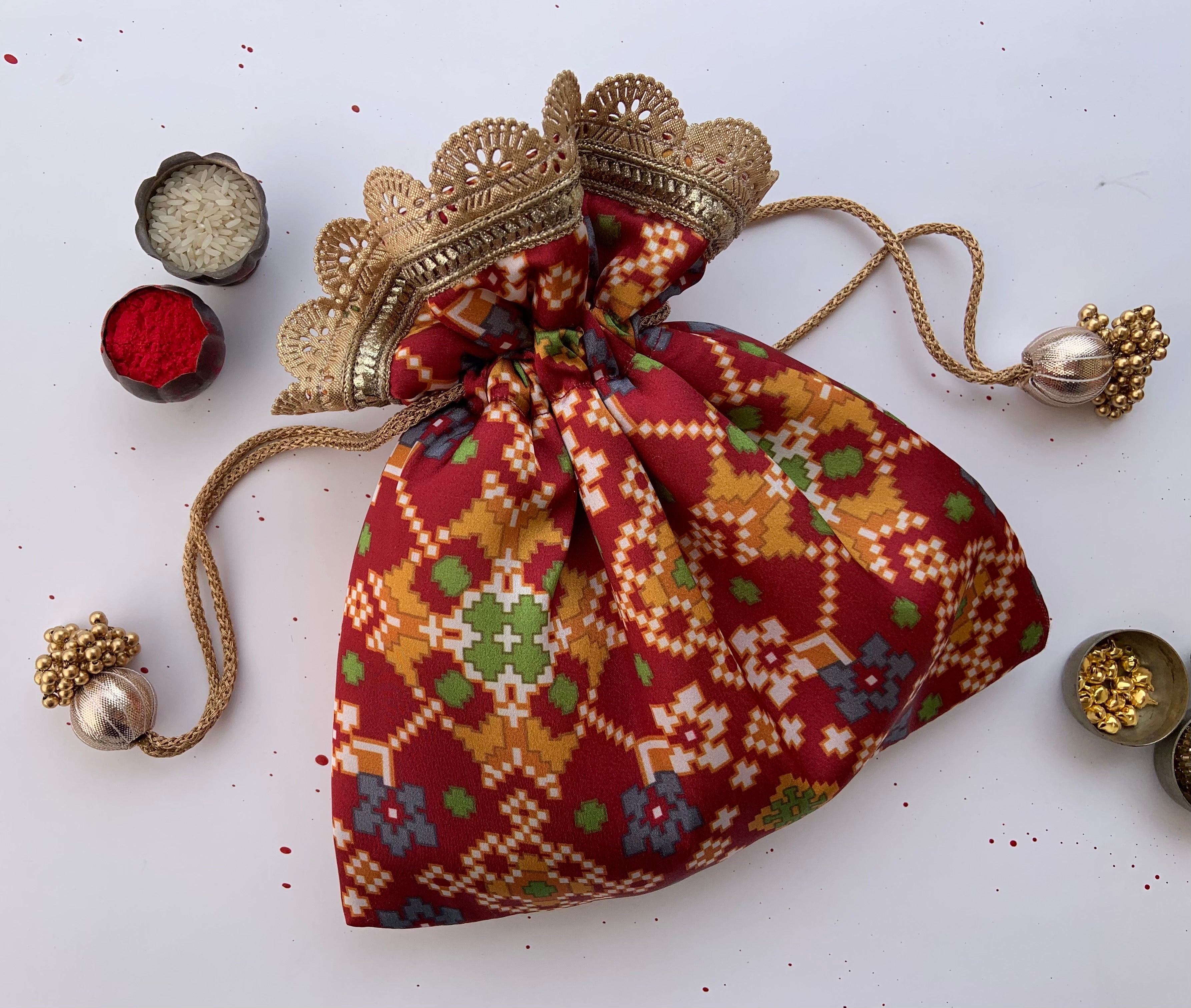 Maroon Navratna Patola Pointed Edge Potli