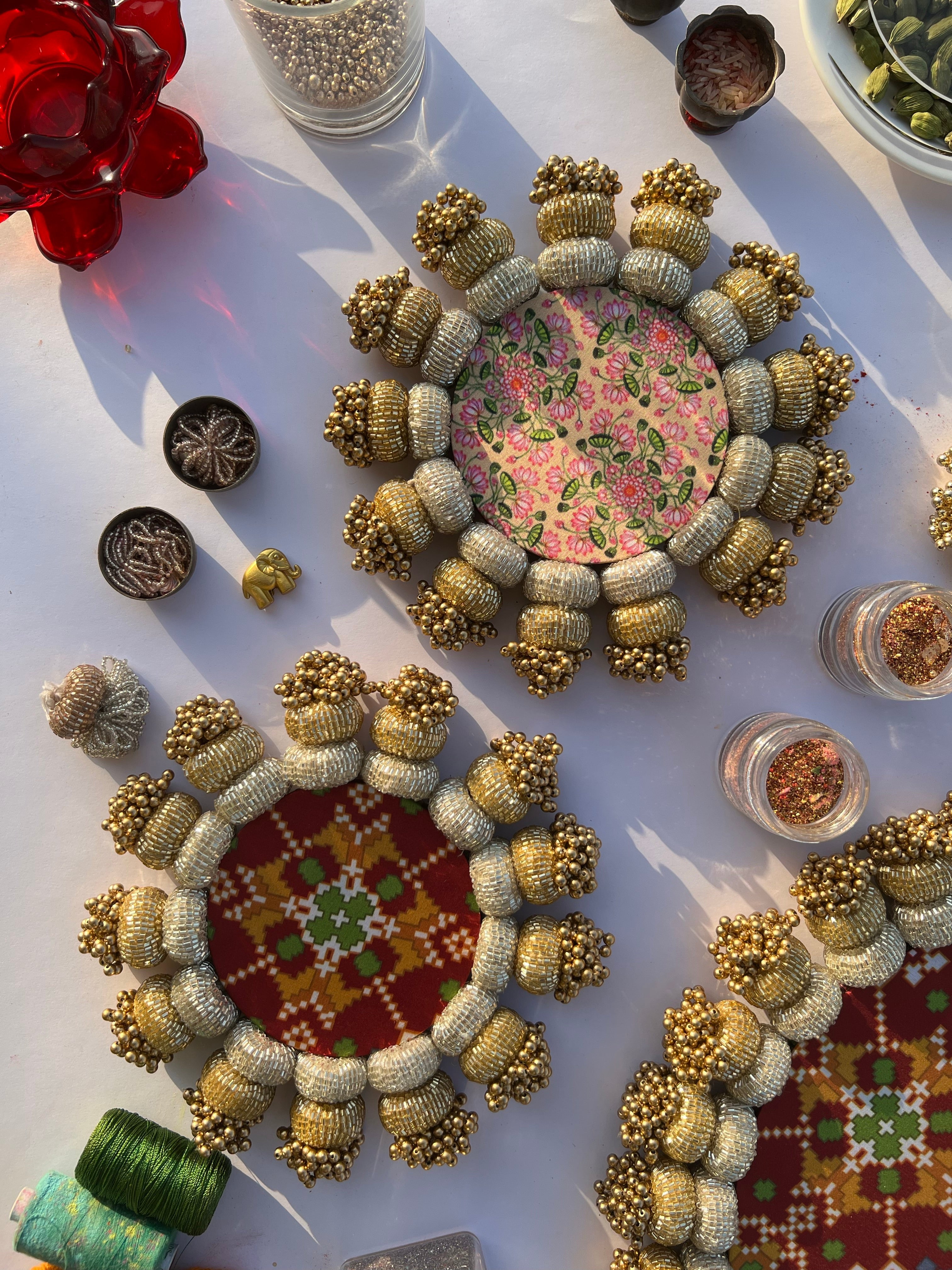 COMBO: Chaandbali Maroon Navratna Patola & Inflorescence Divine Pichwai Rangoli + Diya Pallets