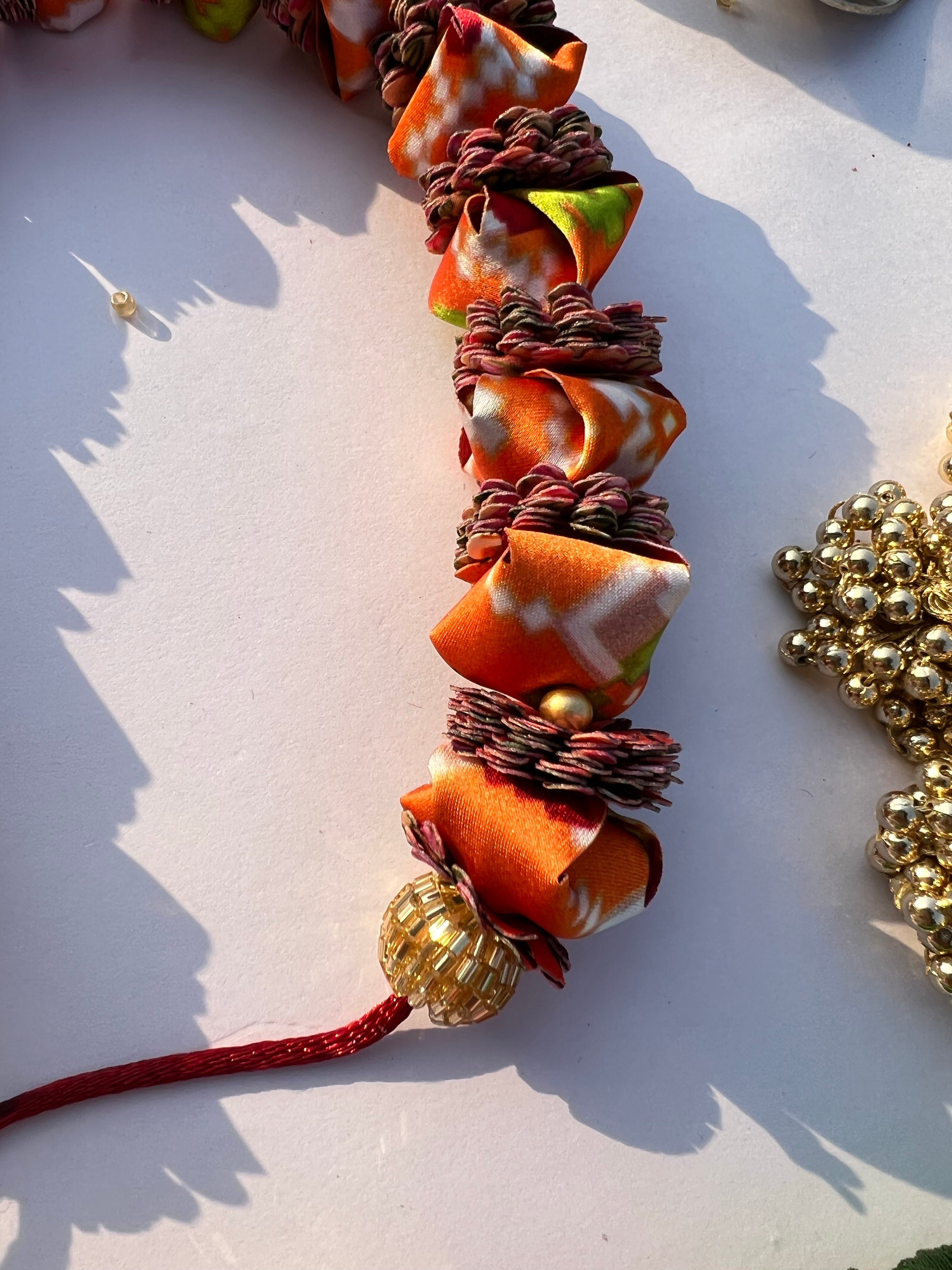 Enchanted + Plumeria Golden Yellow Navratna Patola Gajra- FLOWER GARLAND FOR HAIR